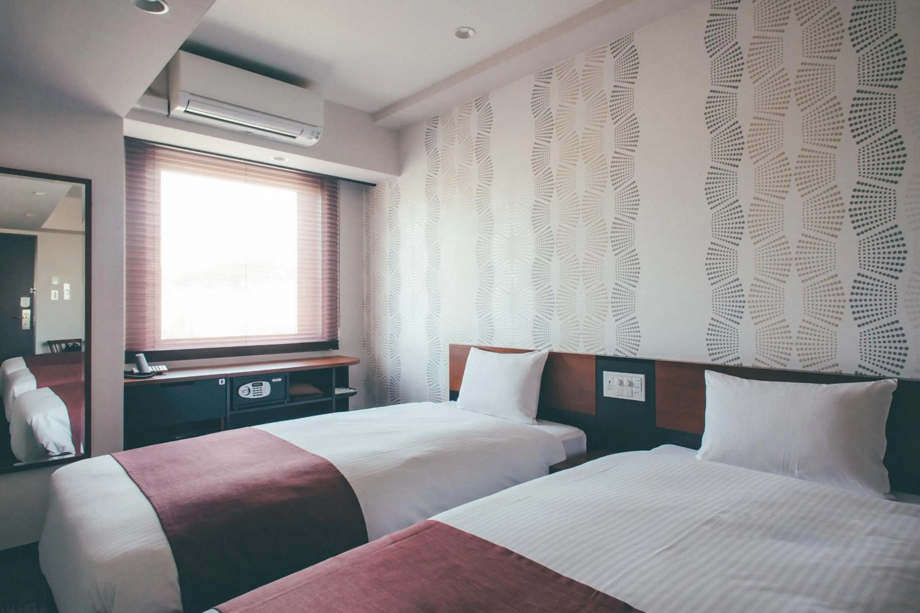 Bed in Hotel Kuretakeso Takayama Ekimae