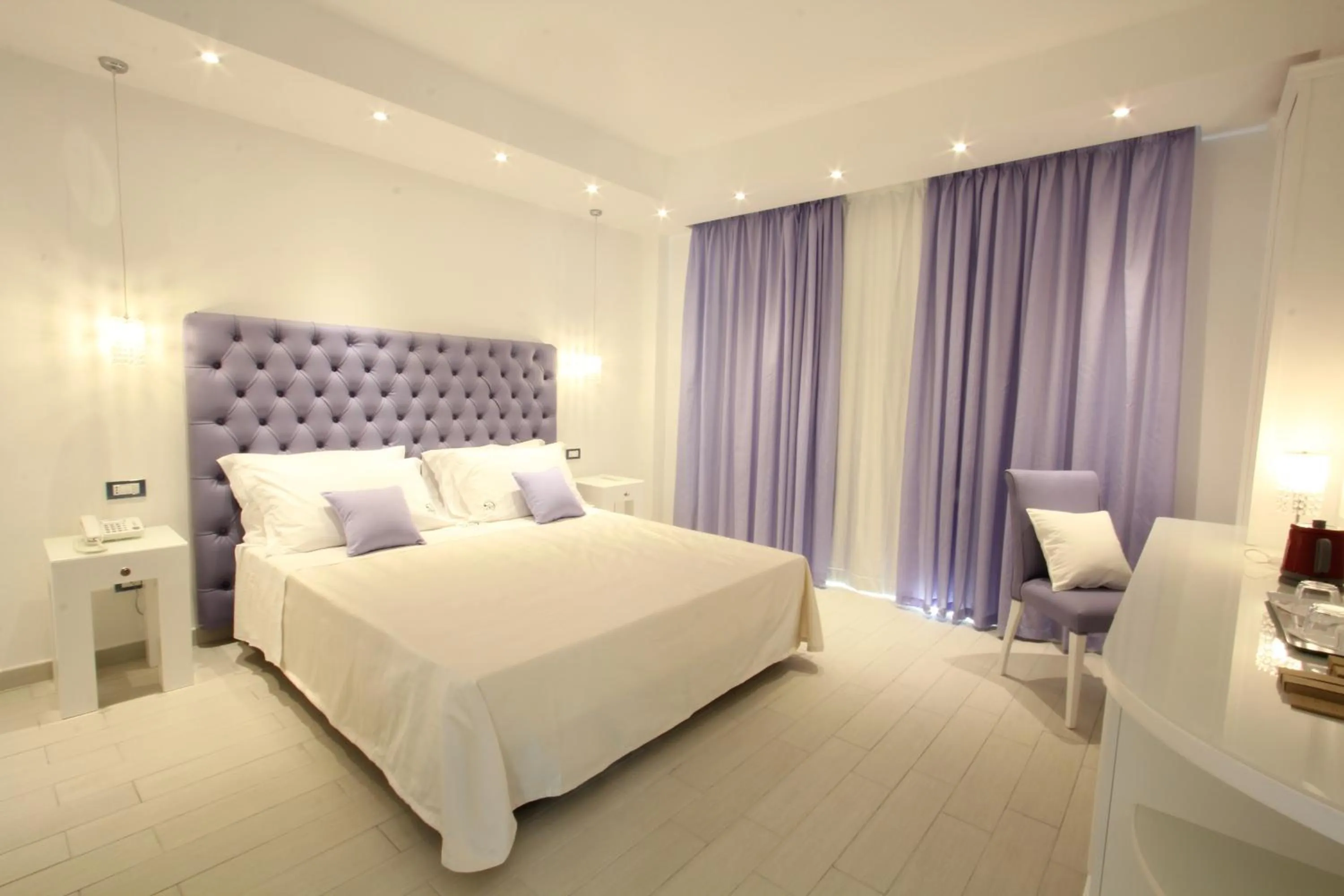 Bed in Ludwig Boutique Hotel & Spa