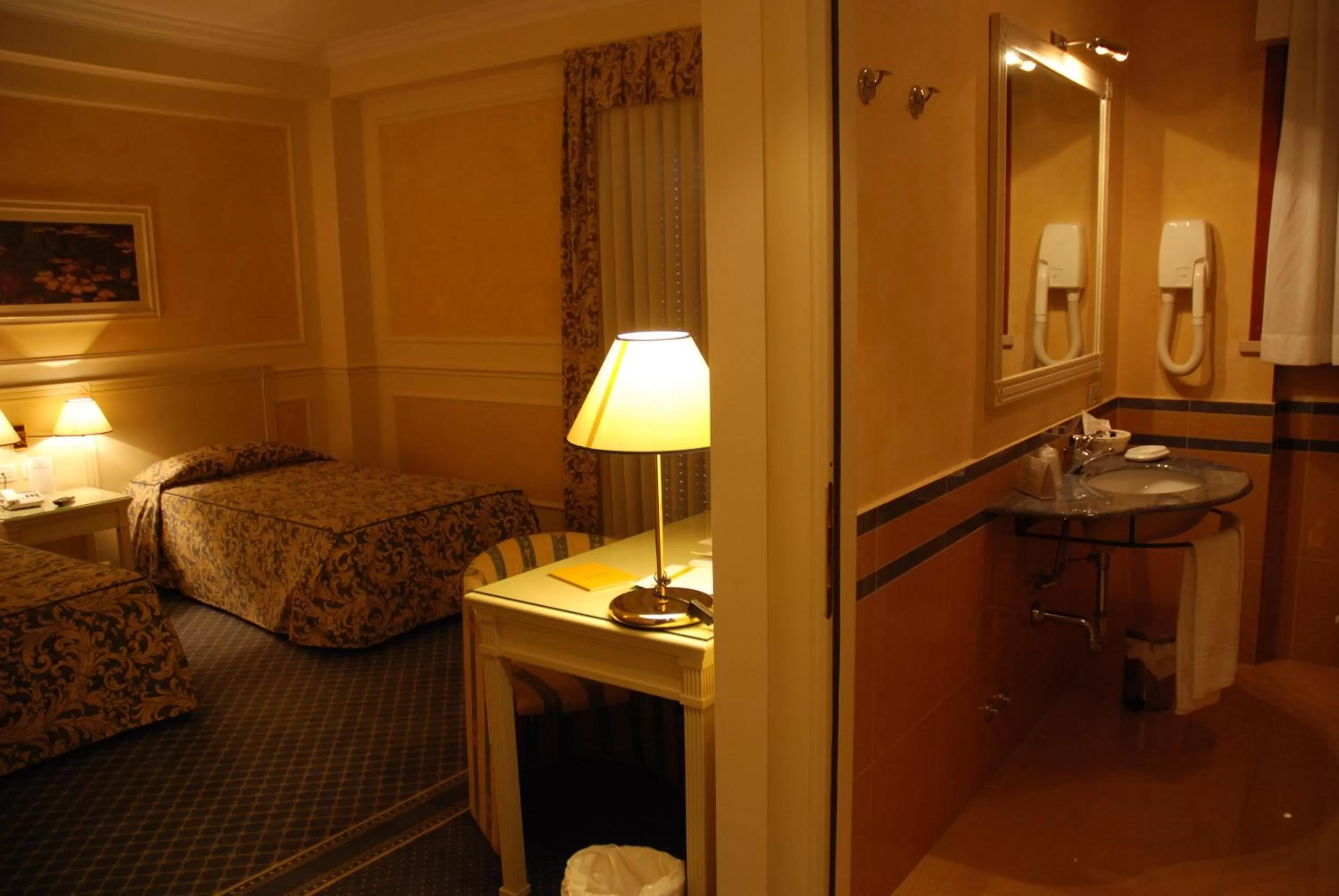 Photo of the whole room, Bed in Hotel Continental Brescia