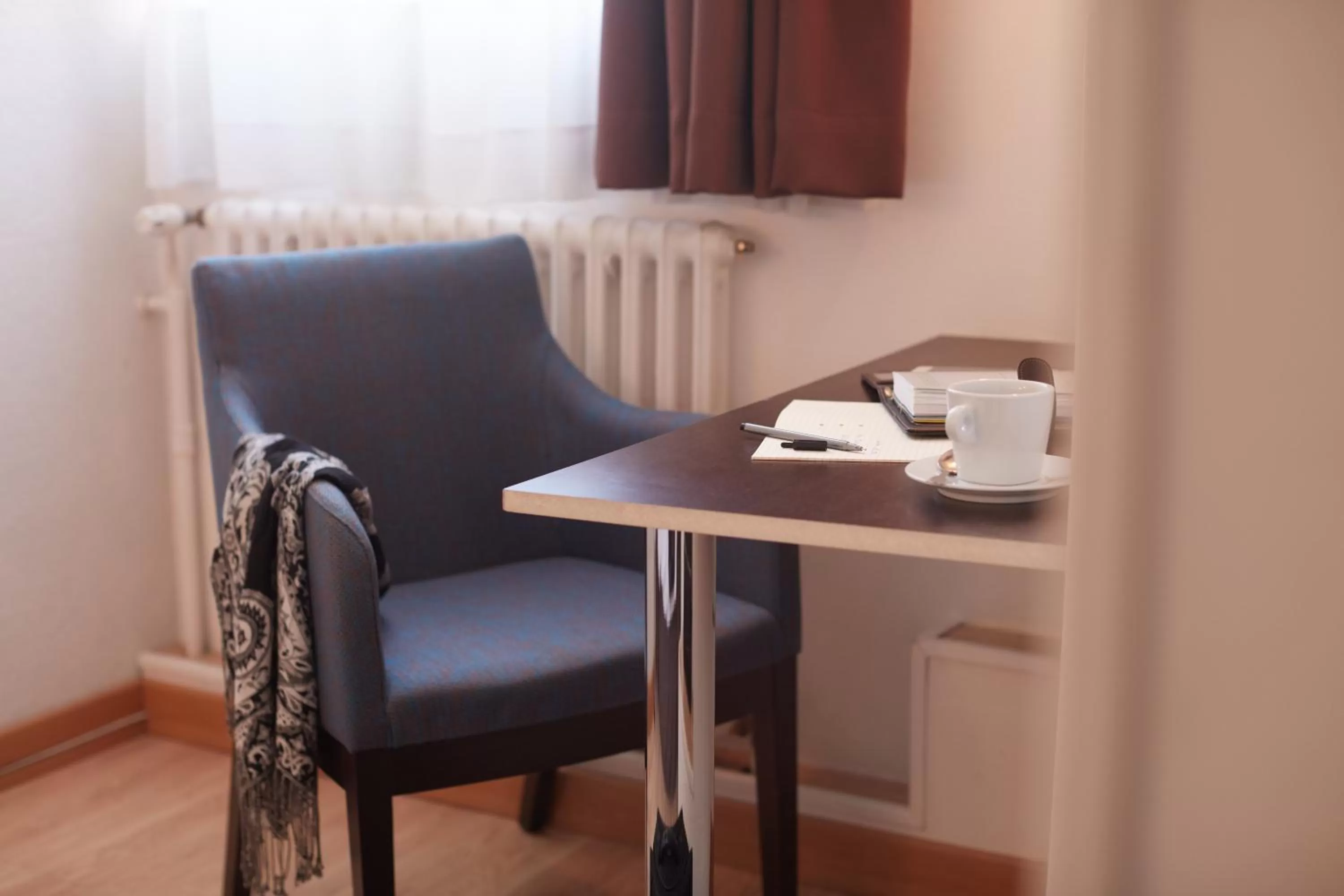 Seating area in Ashley Hôtel Le Mans Centre Gare