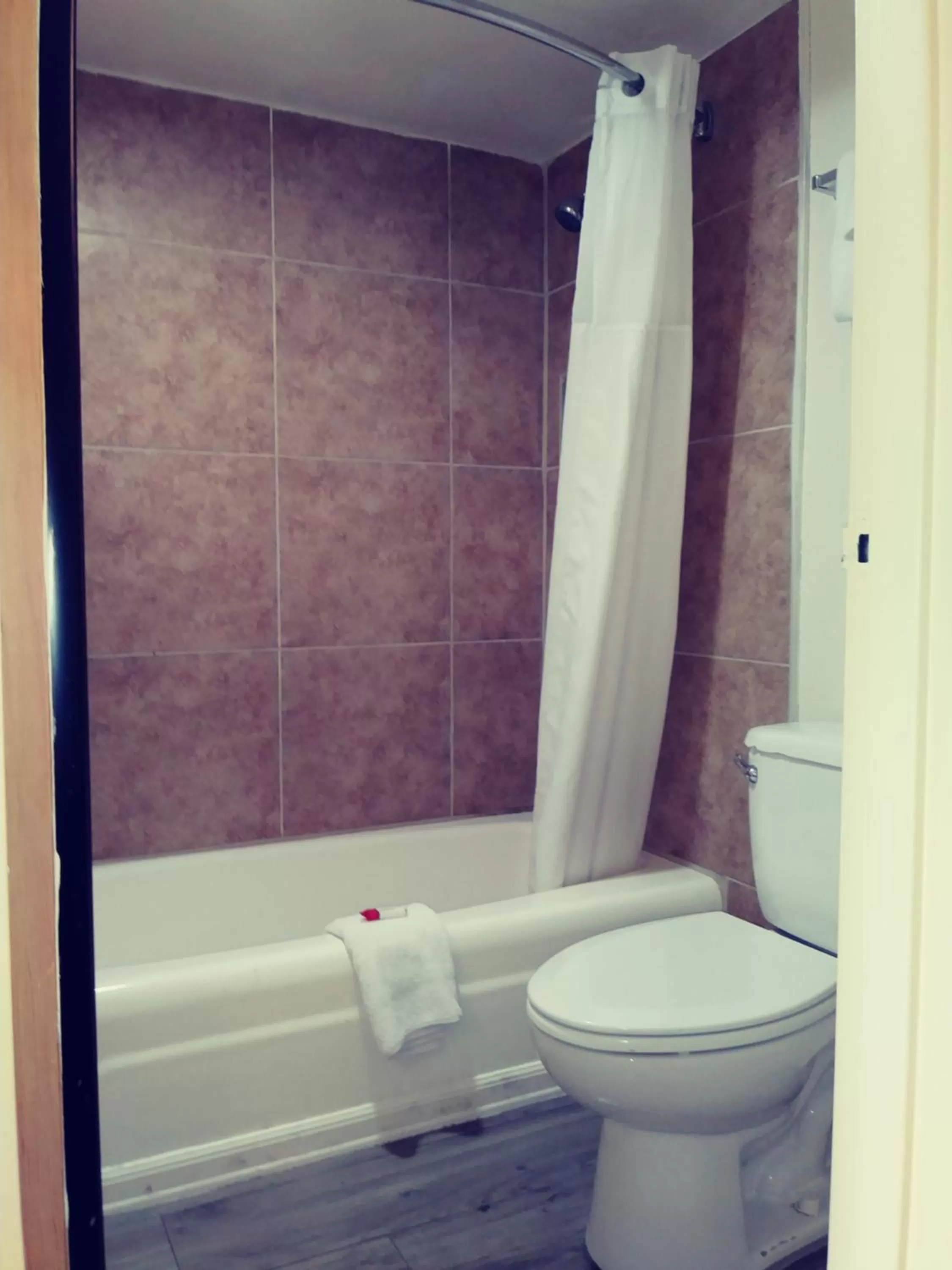 Bathroom in Days Inn by Wyndham Wildwood I-75