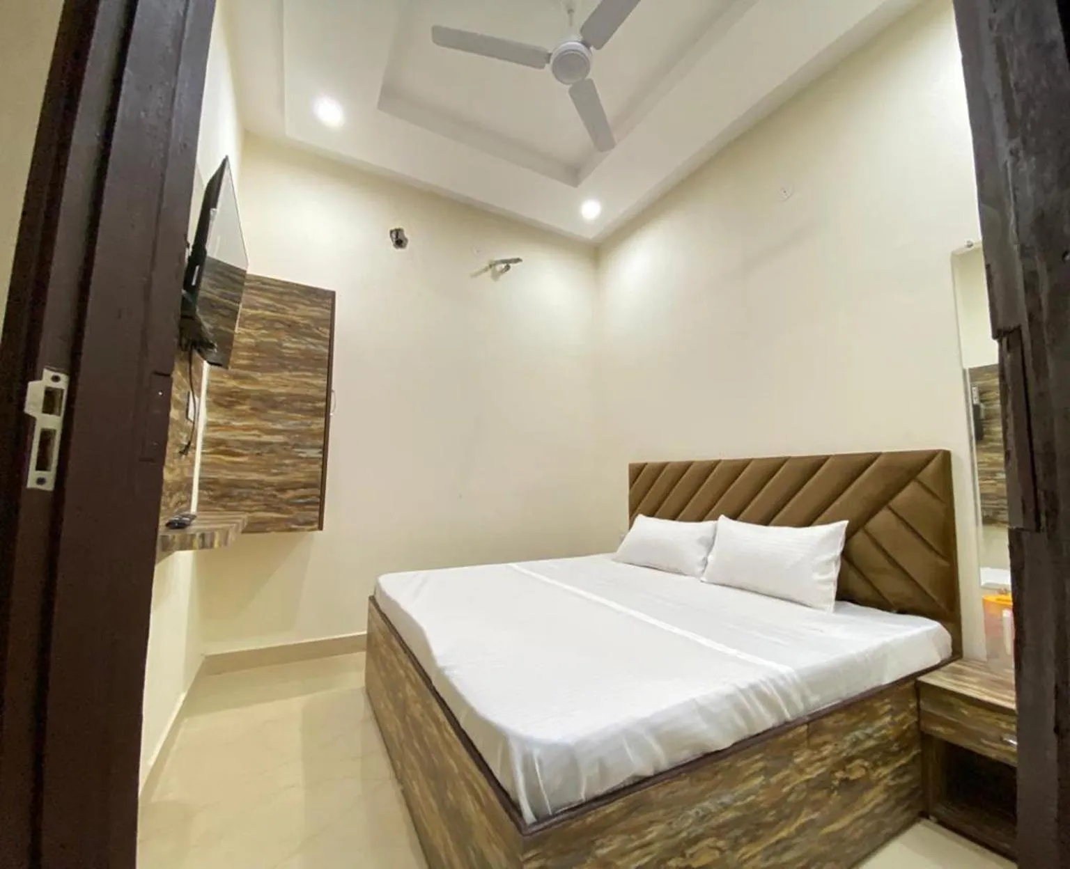 Photo of the whole room, Bed in Naman Homestay