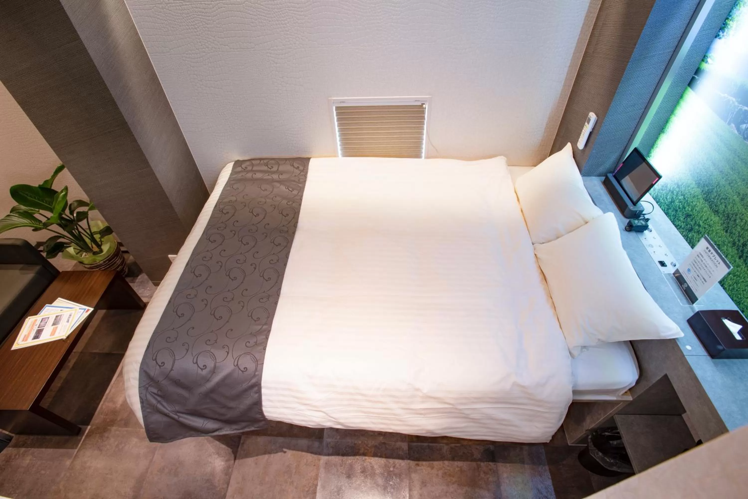 Bed in Pinpon Hotel Hiroshima