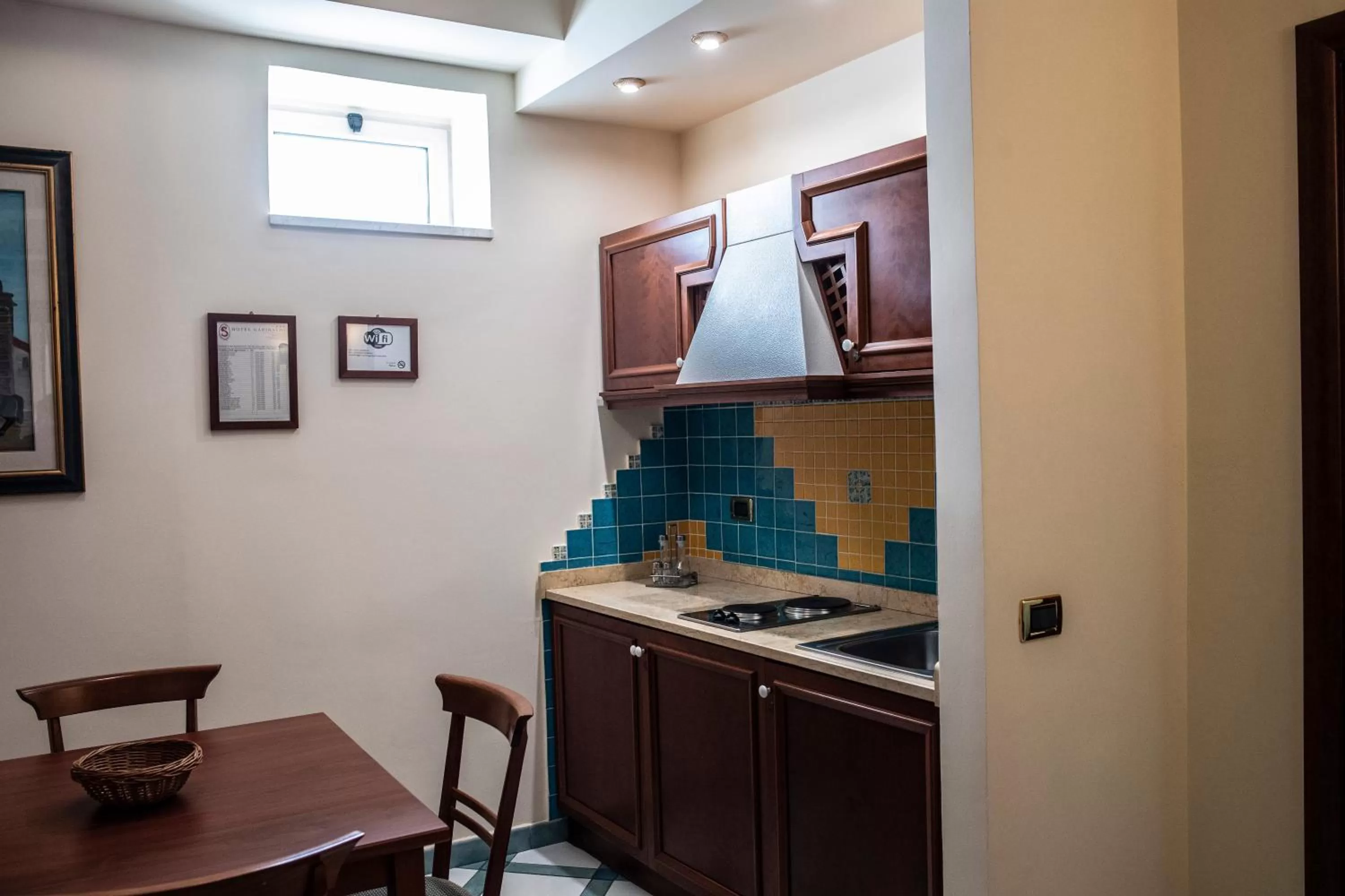 Kitchen or kitchenette in Hotel Garibaldi