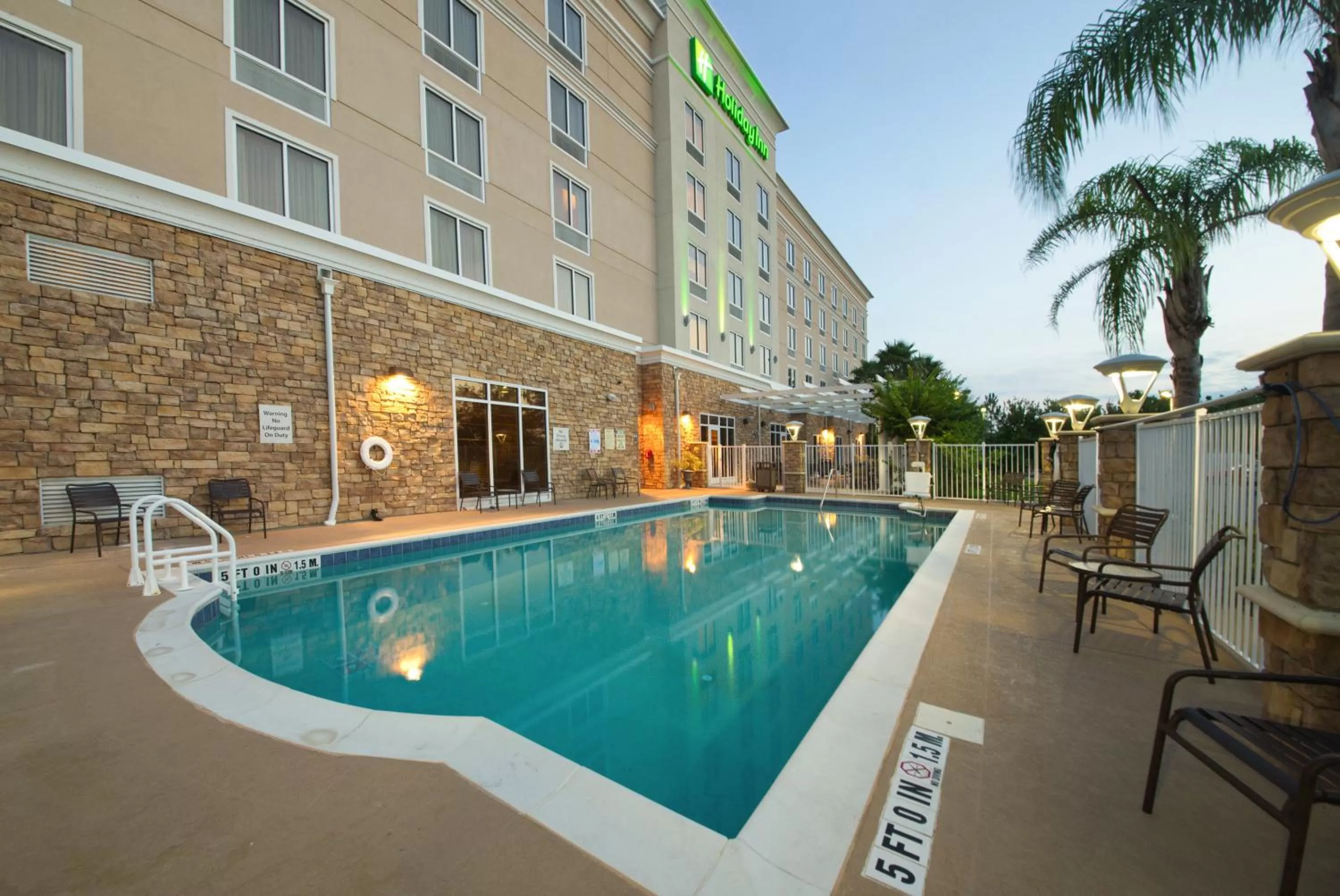 Swimming pool in Holiday Inn Titusville/Kennedy Space Center by IHG