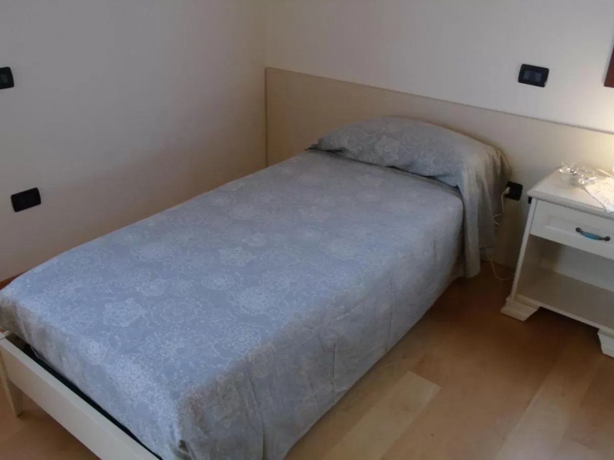 Bed in B&B Ai Cipressi