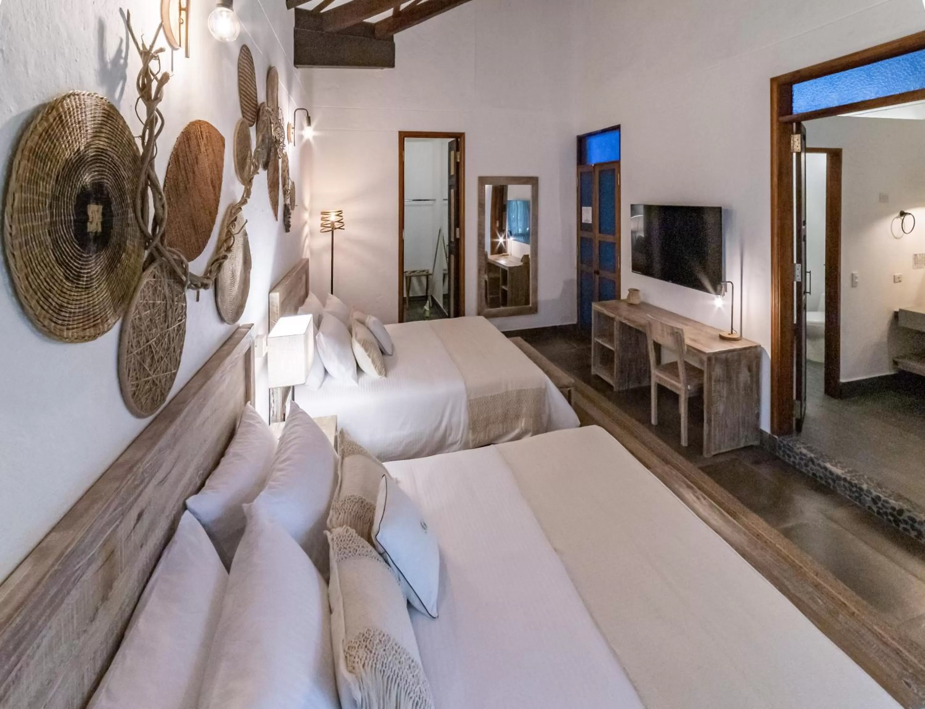 Bed in Casa Jacaranda Hotel Boutique