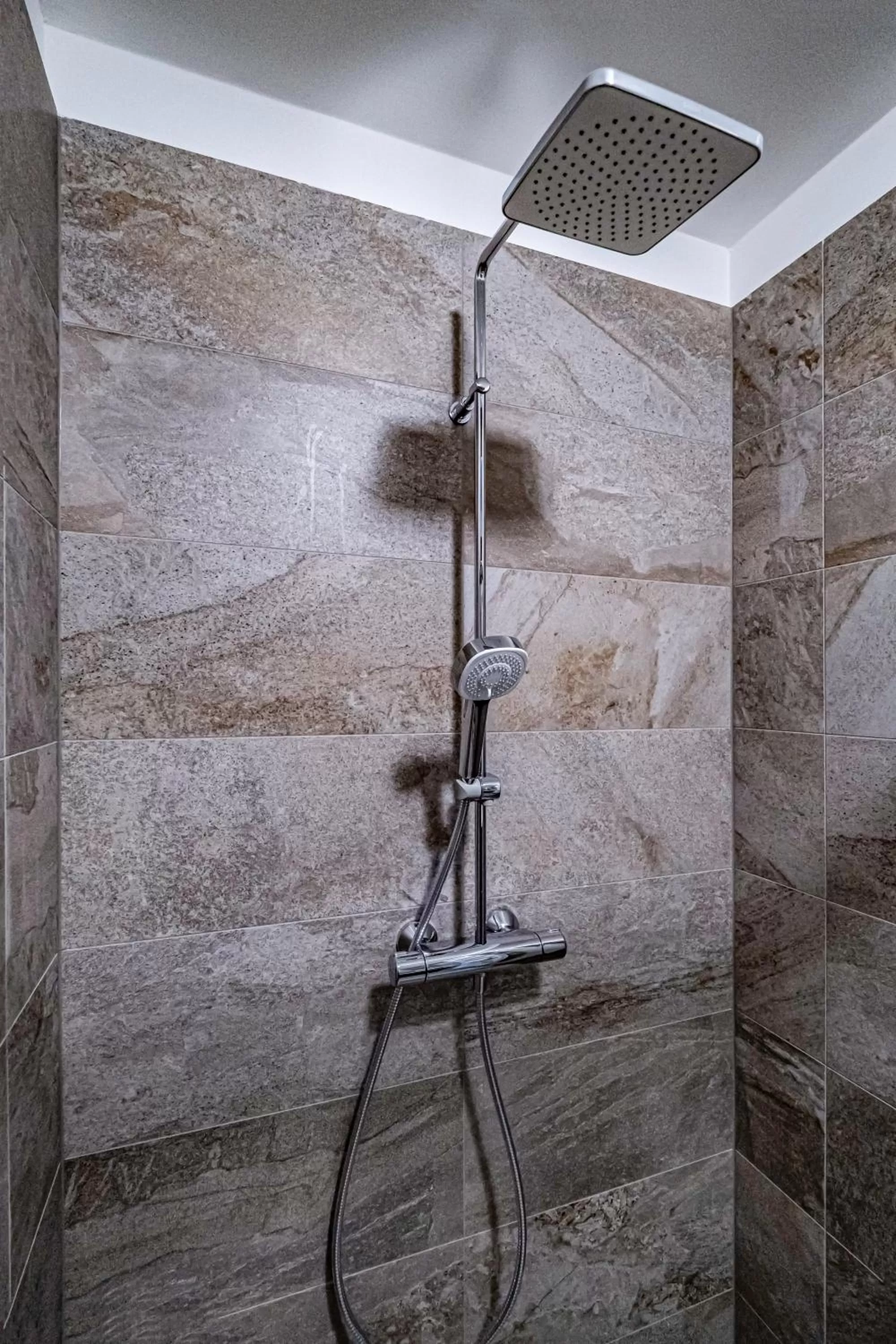 Bathroom in Relax Hotel Stork