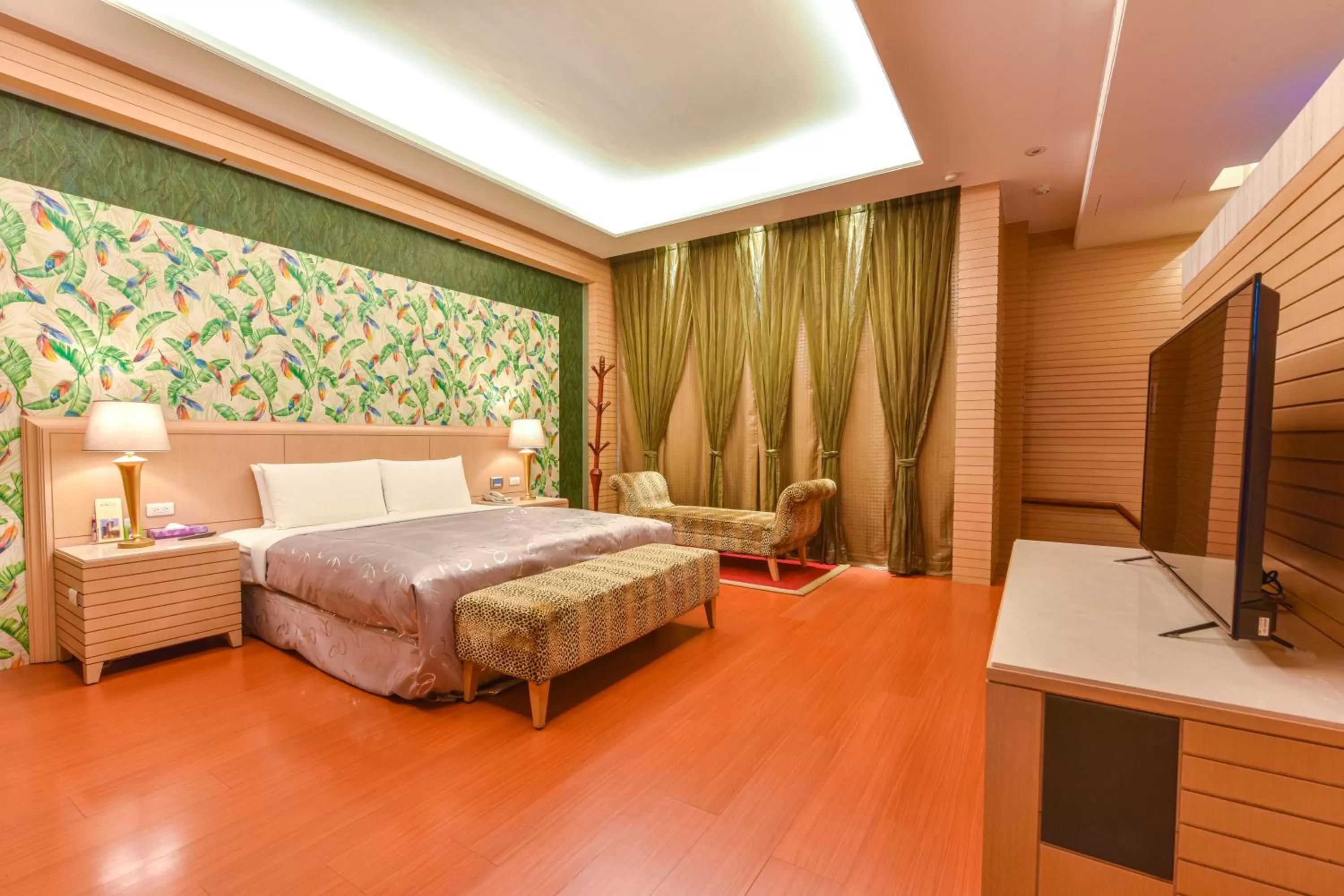 Bed in Purple Garden Motel