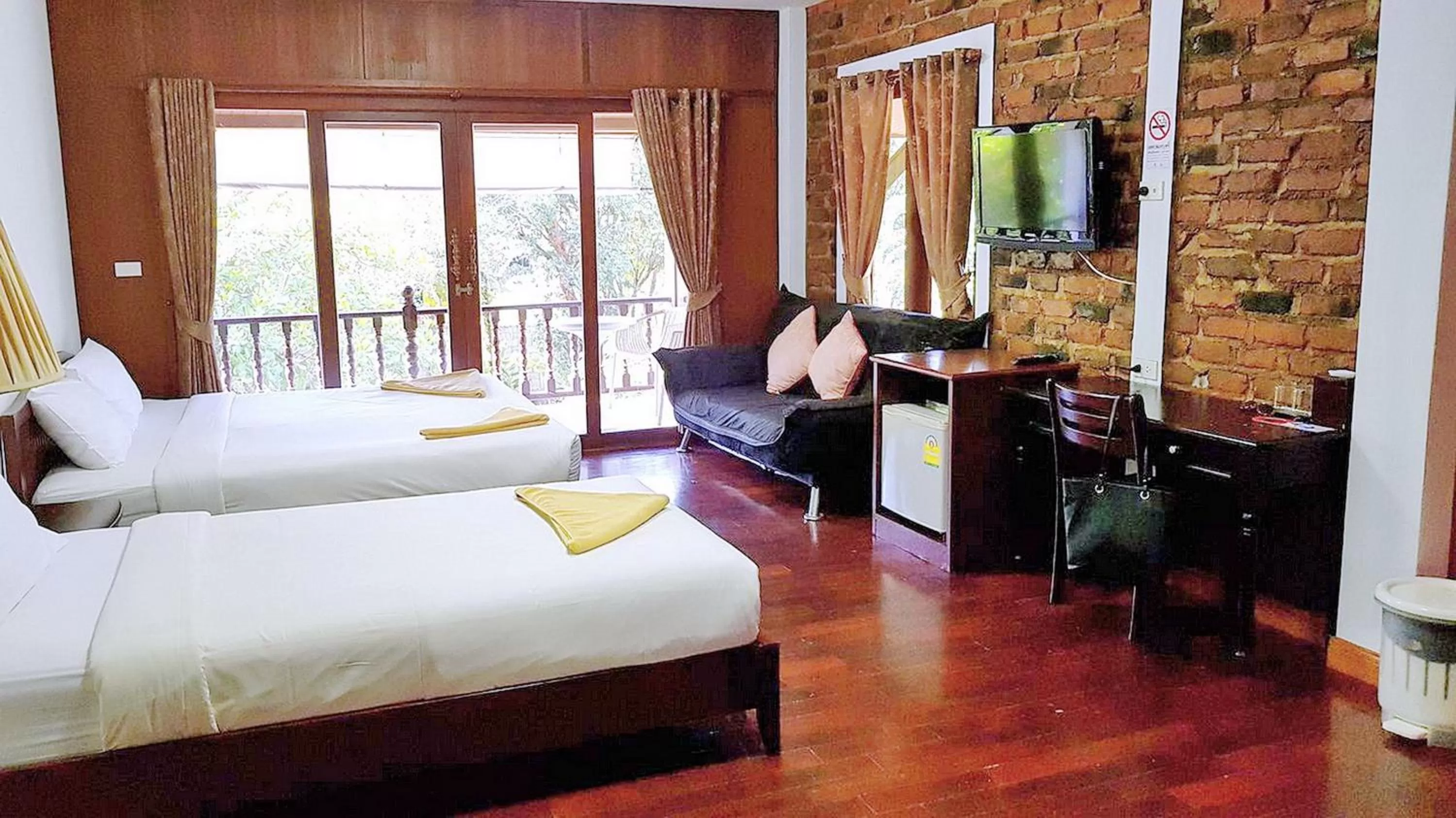 Photo of the whole room, Bed in Doo Dee Boutique Resort by Swiss Chalet