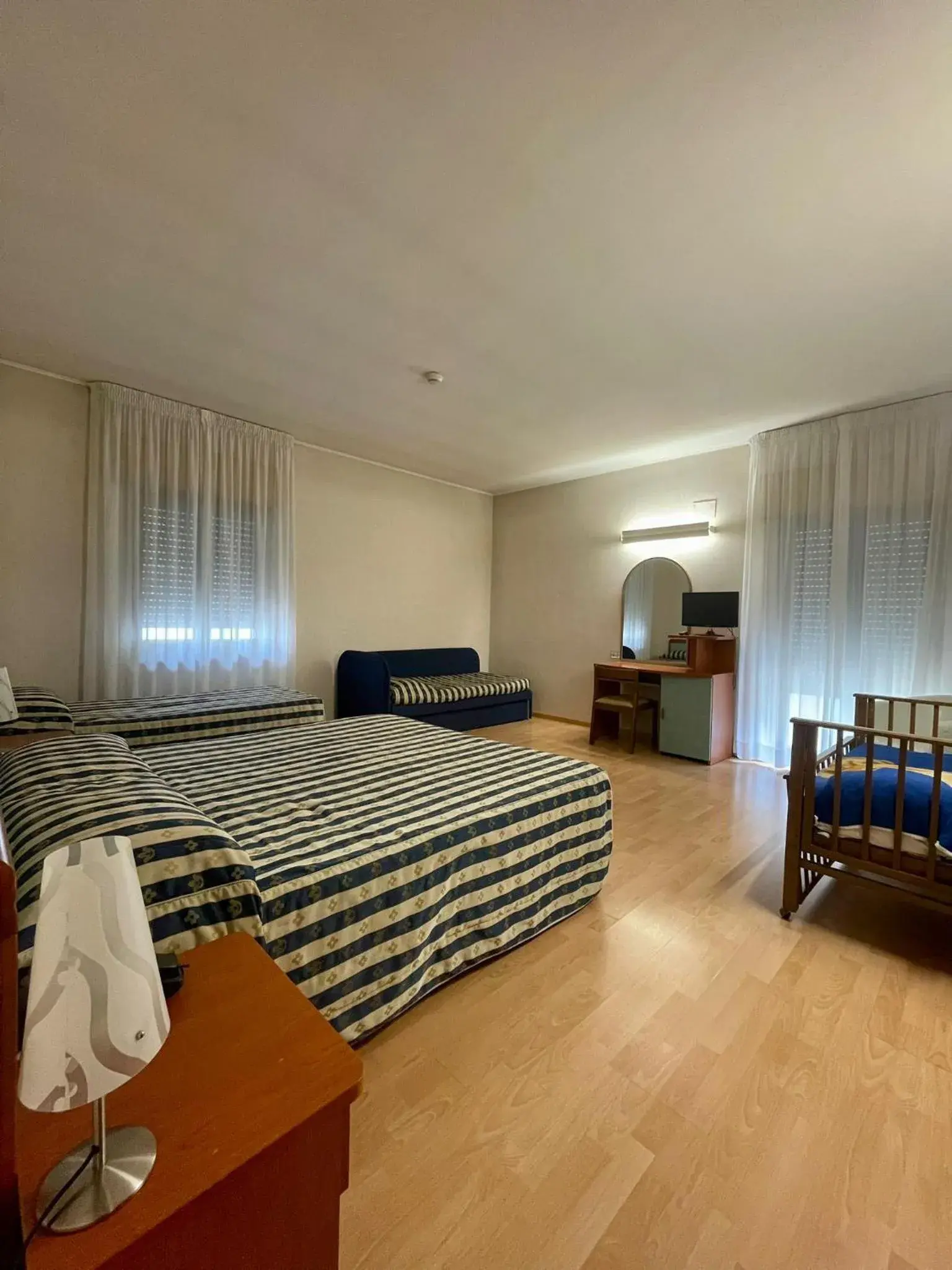 Quadruple Room in Hotel La Pergola Quadruple Room in Hotel La Pergola