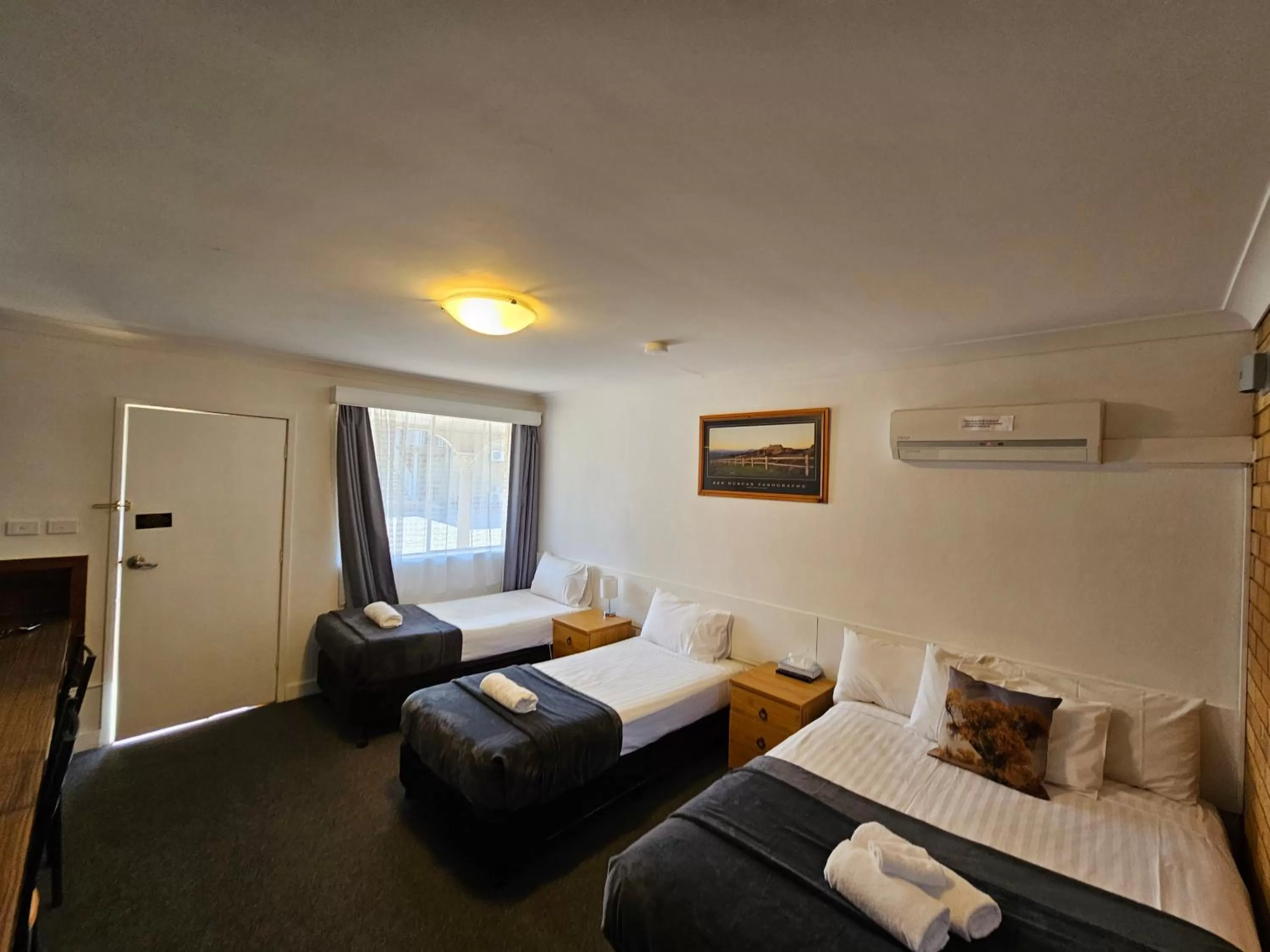 Bed in Hunter Valley Motel