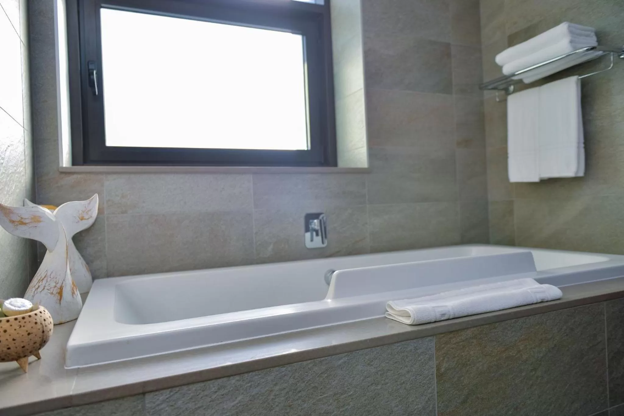 Bathroom in Crowne Plaza - Dar Es Salaam by IHG