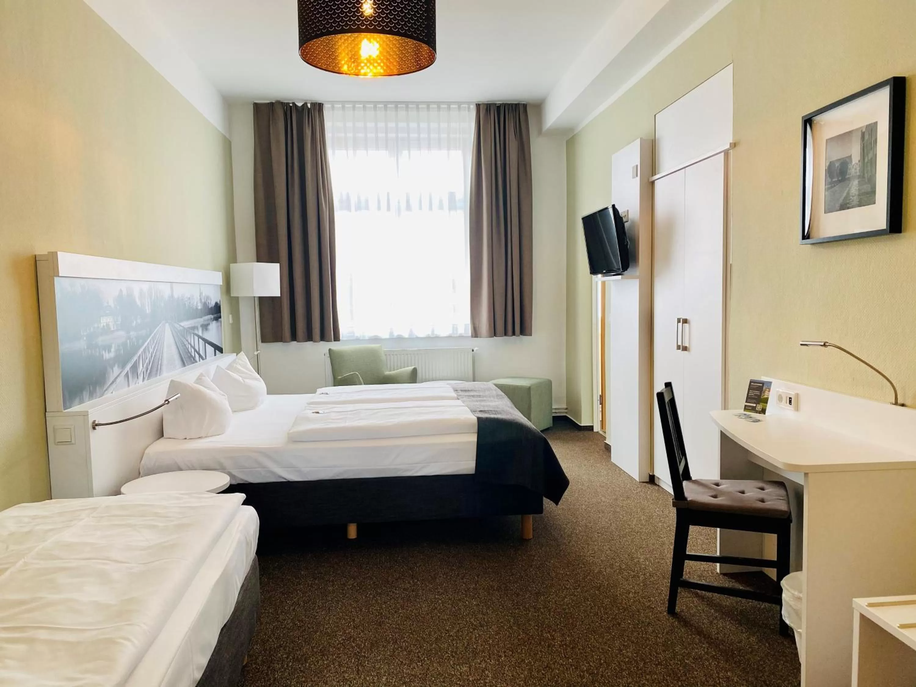 Photo of the whole room, Bed in Hotel am Schlosspark