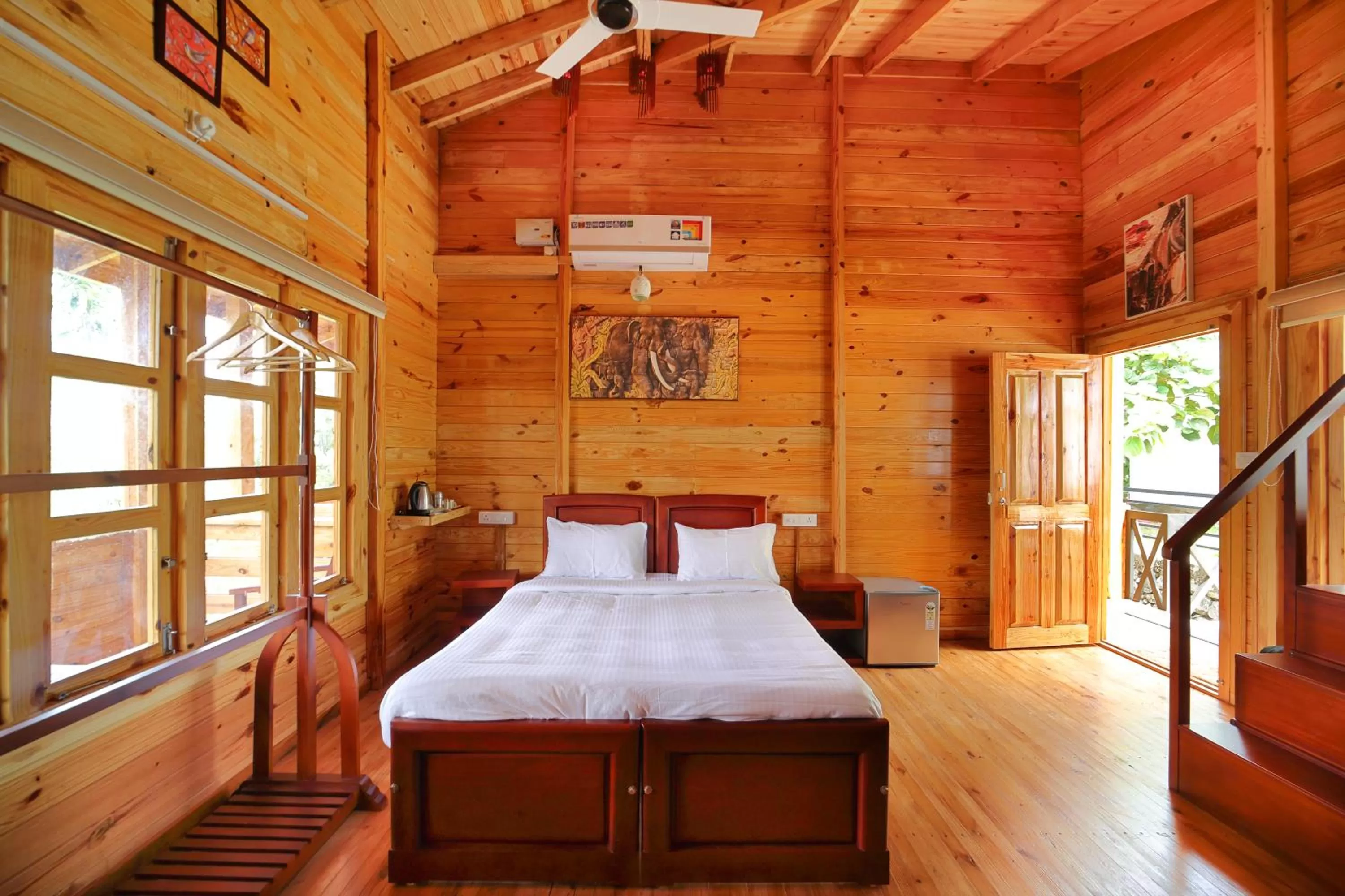 Bed in Woodrose Resort