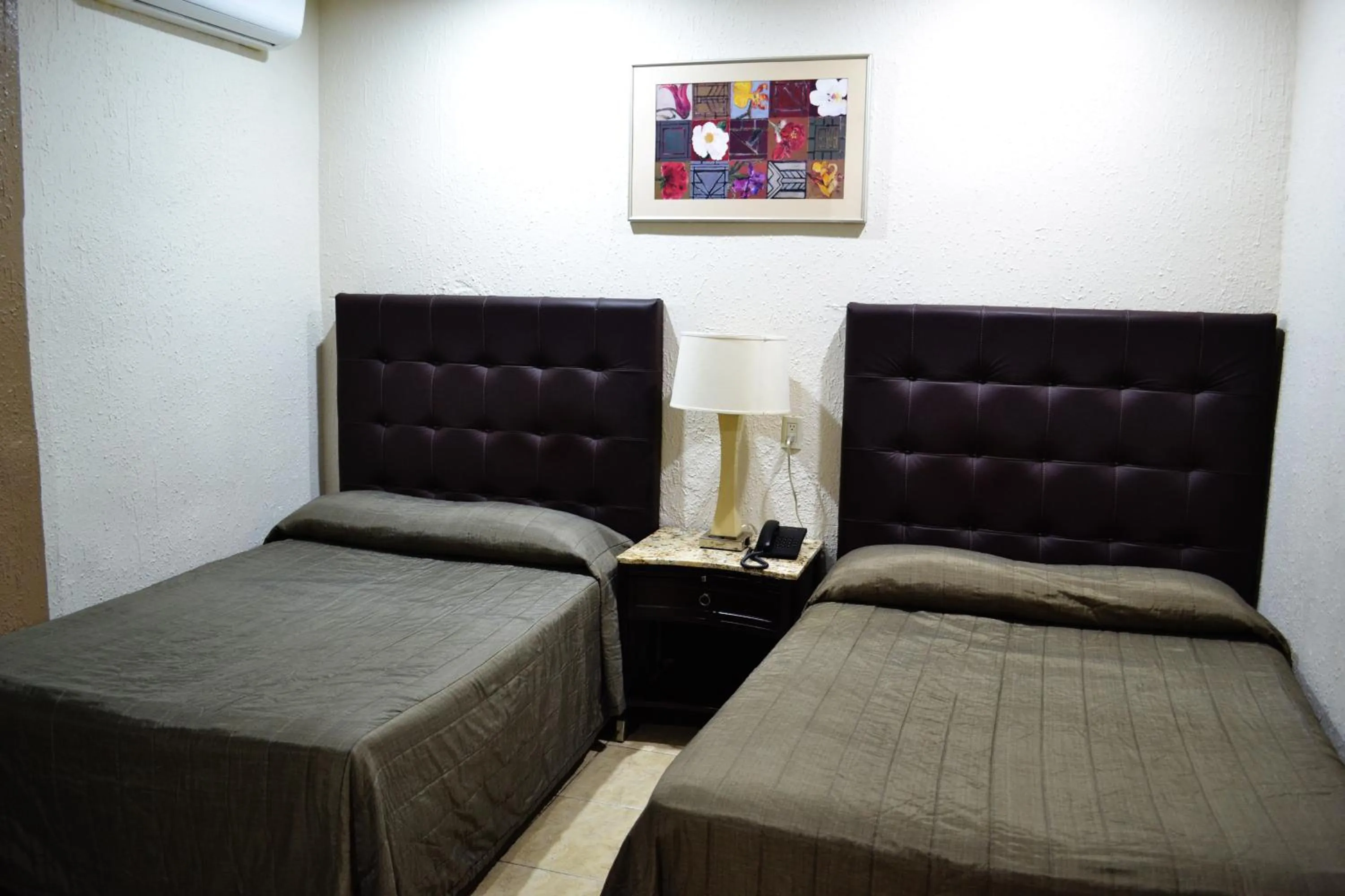 Bed in Hotel America Palacio