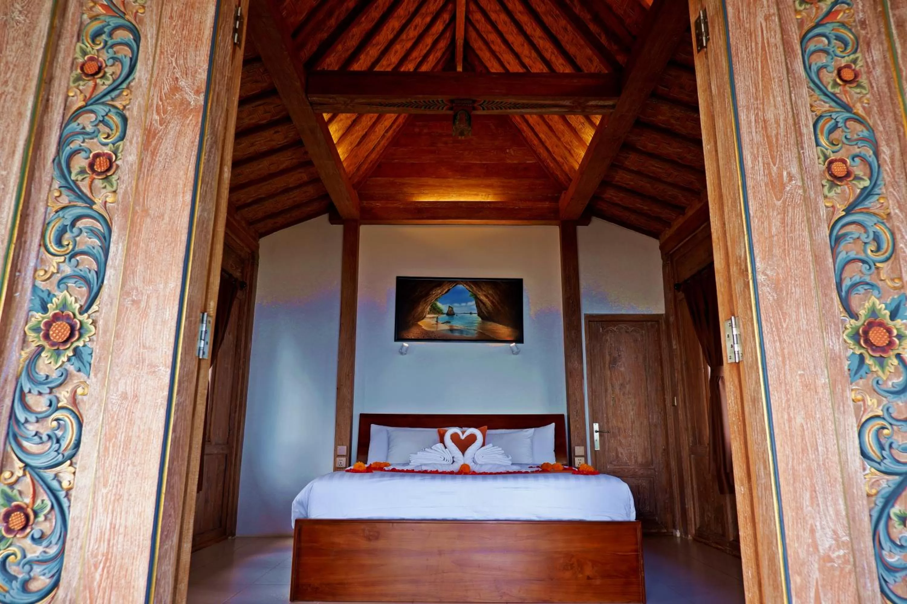 Bed in Blue Harbor Beachfront Villas & Resto