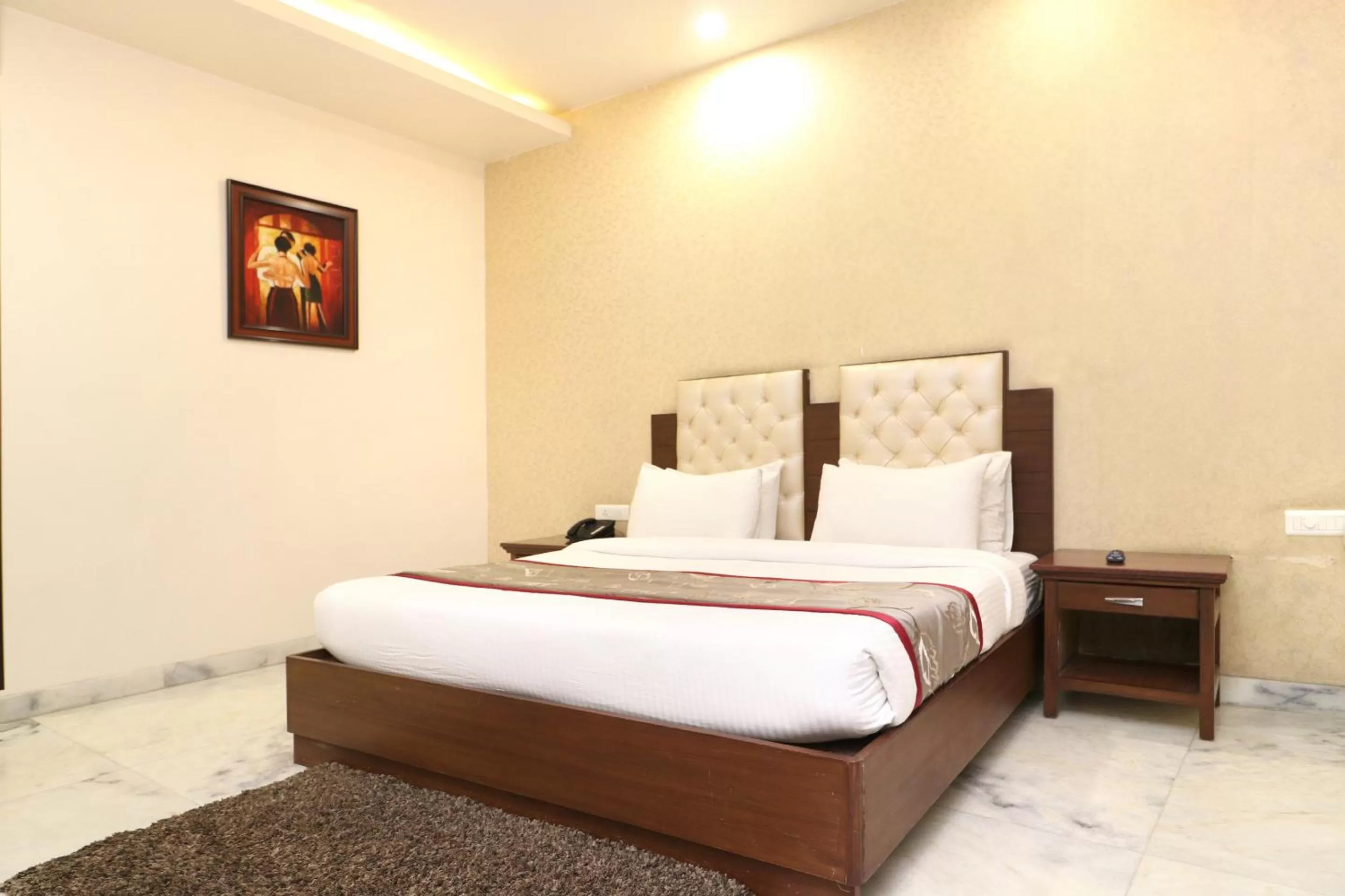 Bed in Hotel Leela Grande