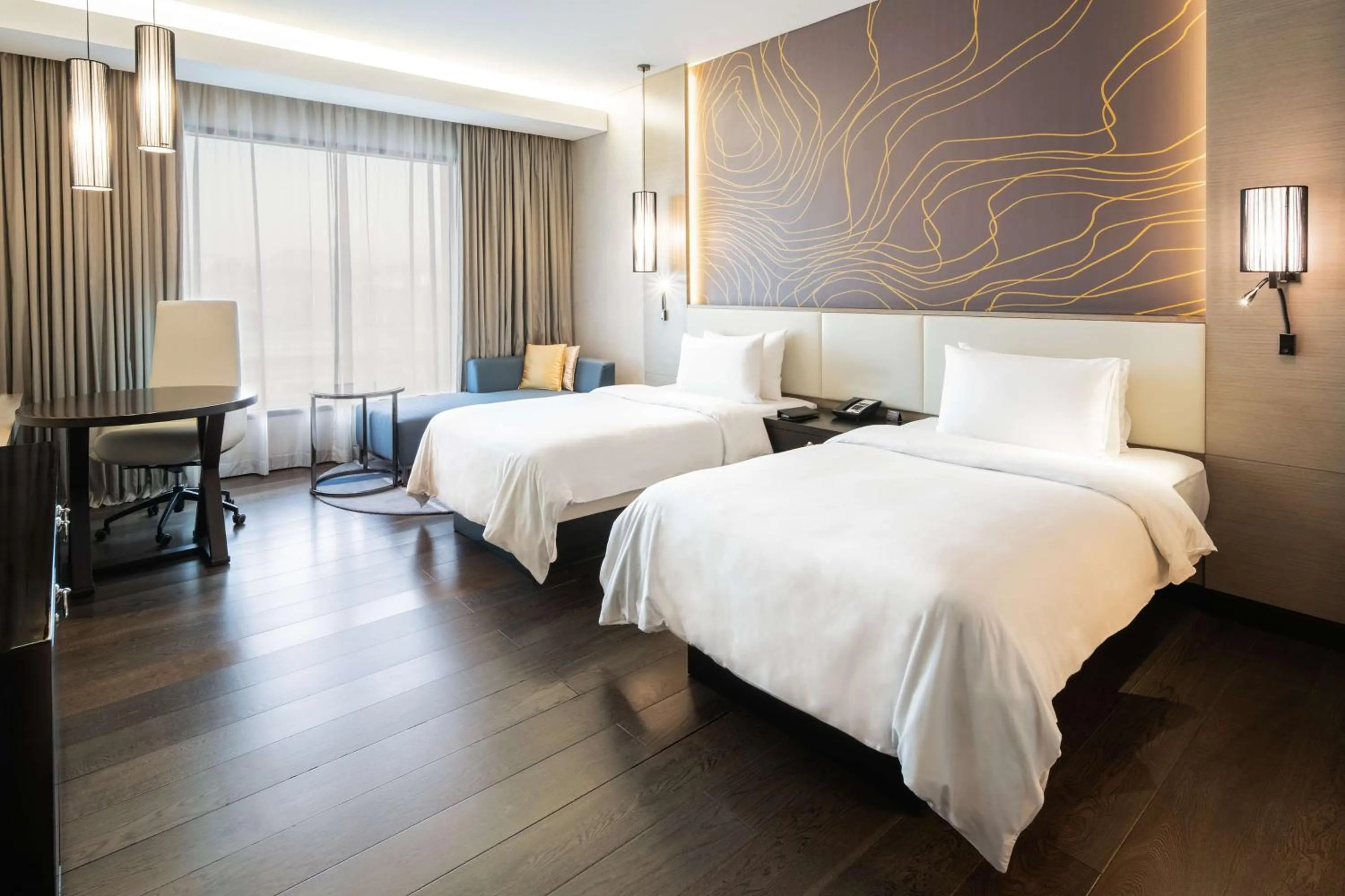 Photo of the whole room, Bed in Radisson Collection Muscat, Hormuz Grand