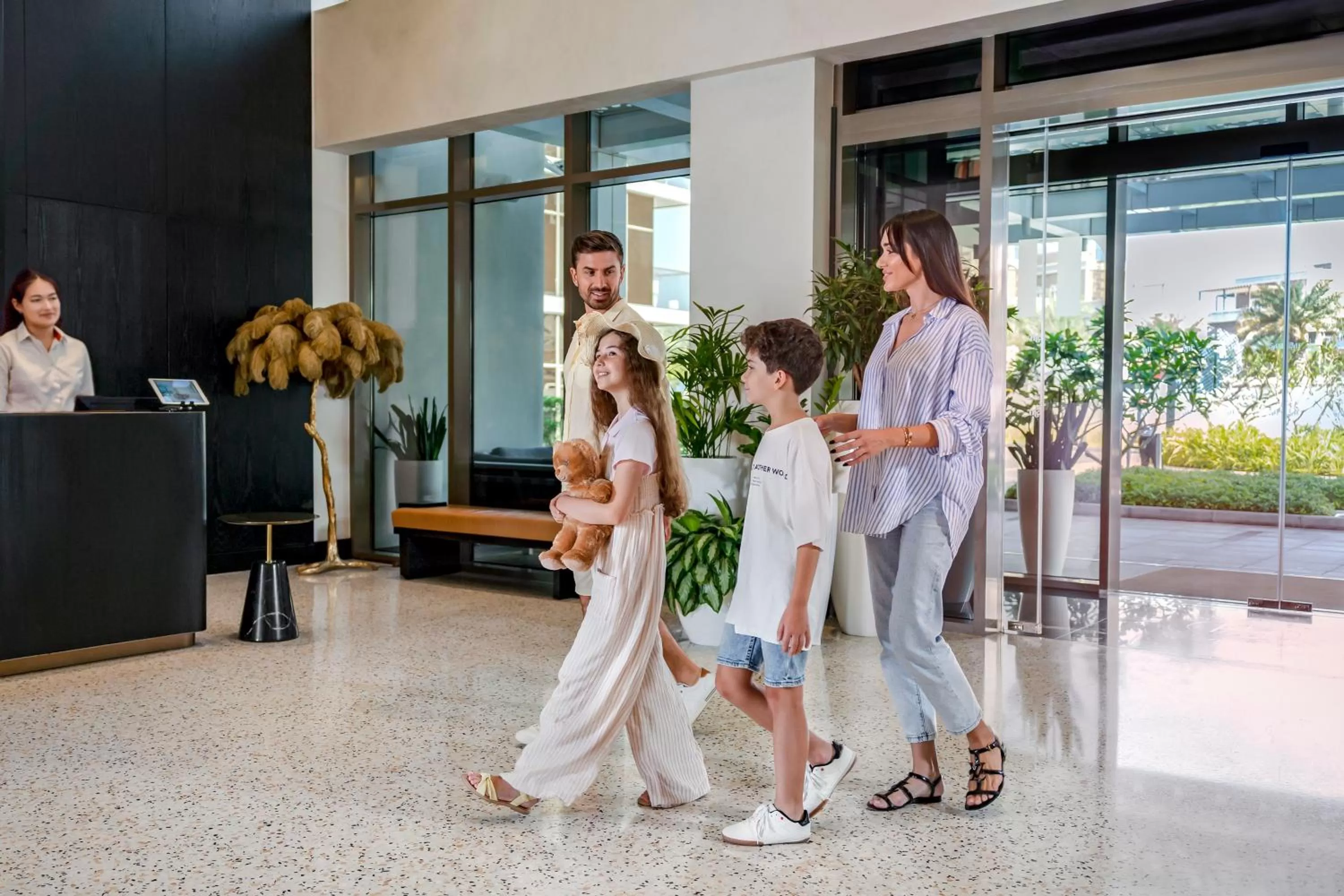 People in Th8 Palm Dubai Beach Resort Vignette Collection, an IHG hotel