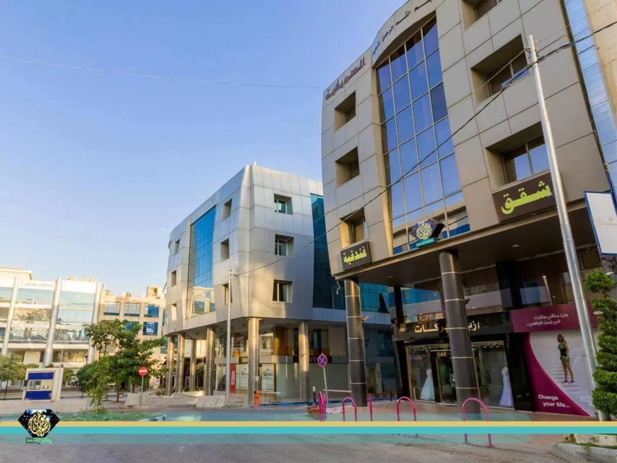 Property building, Swimming Pool in Jawharet Alswefiah Hotel Suites