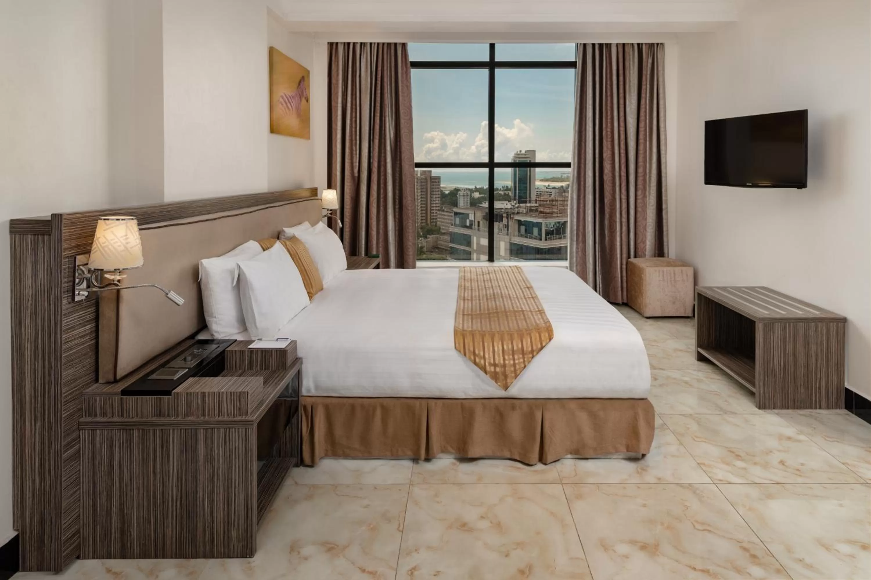 Bed in Golden Tulip Dar Es Salaam City Center Hotel