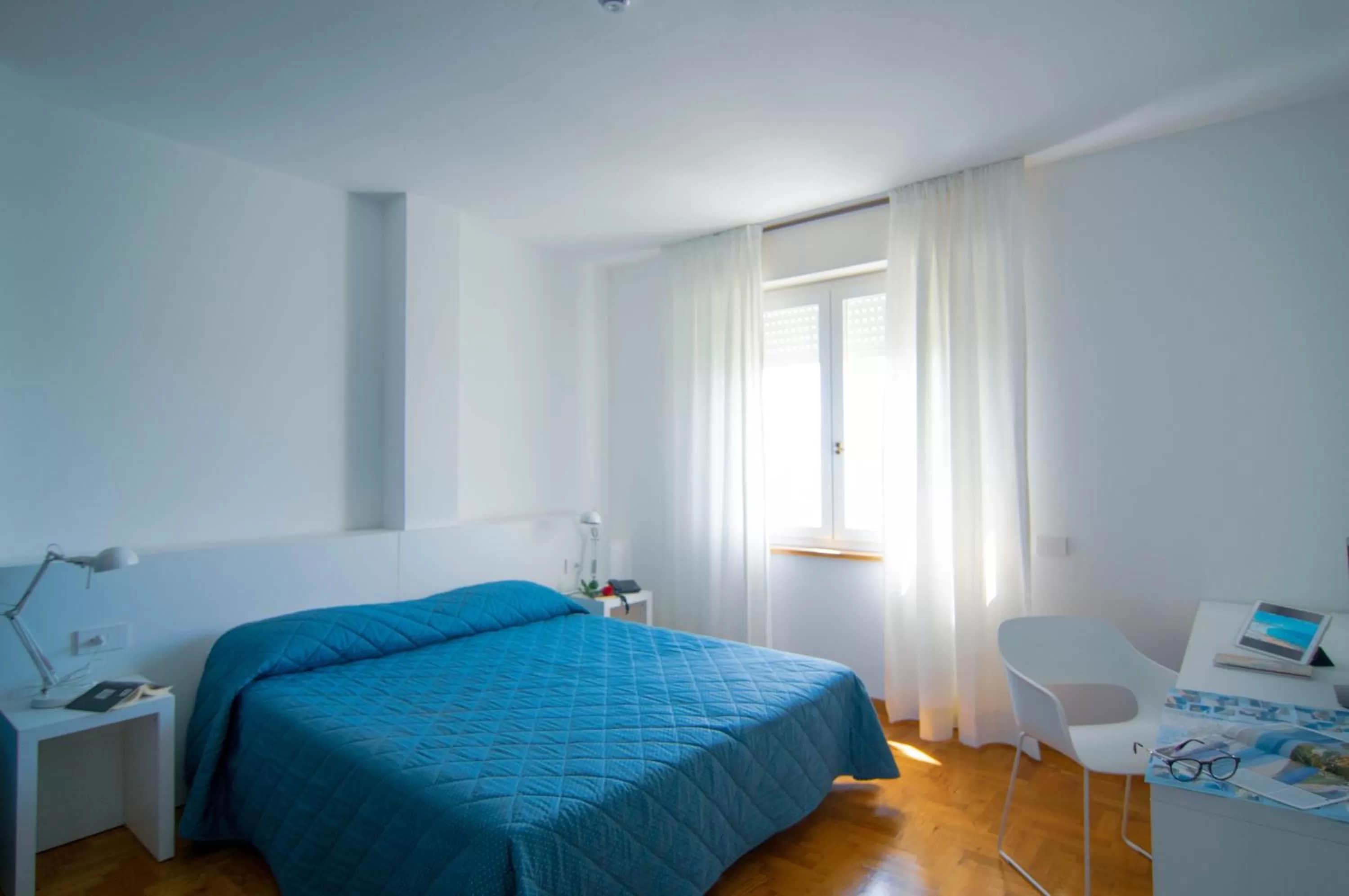 Bed in Hotel Mistral