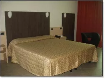 Bedroom in Hotel Lux