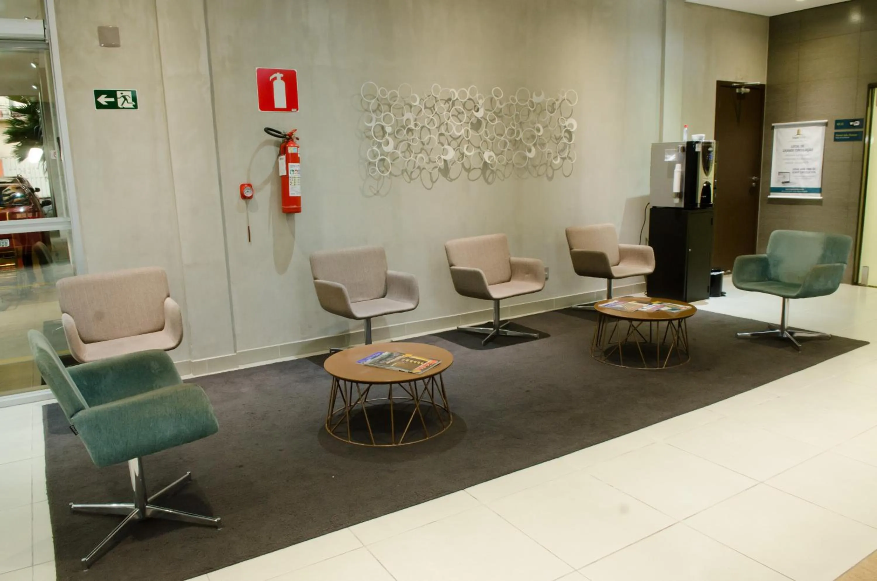 Lobby or reception in Ímpar Suítes Expominas