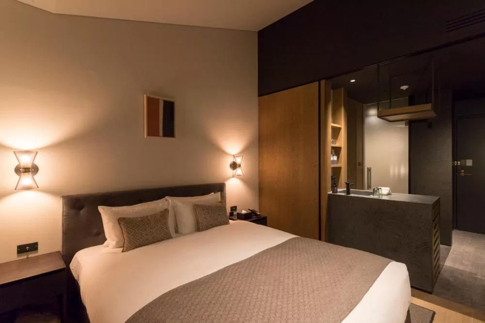 Bed in HOTEL CANATA KYOTO