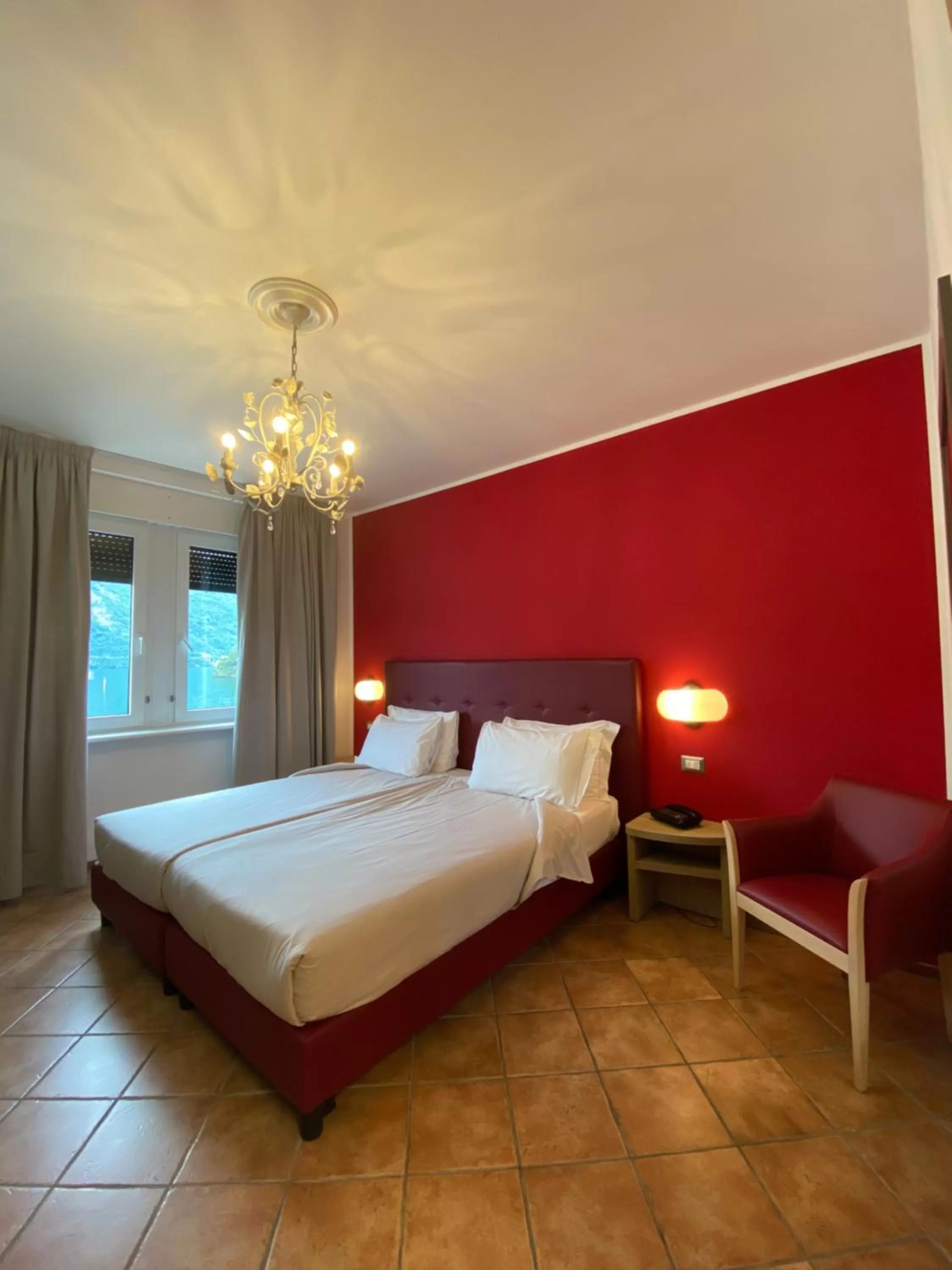 Photo of the whole room, Bed in Hotel Lenno