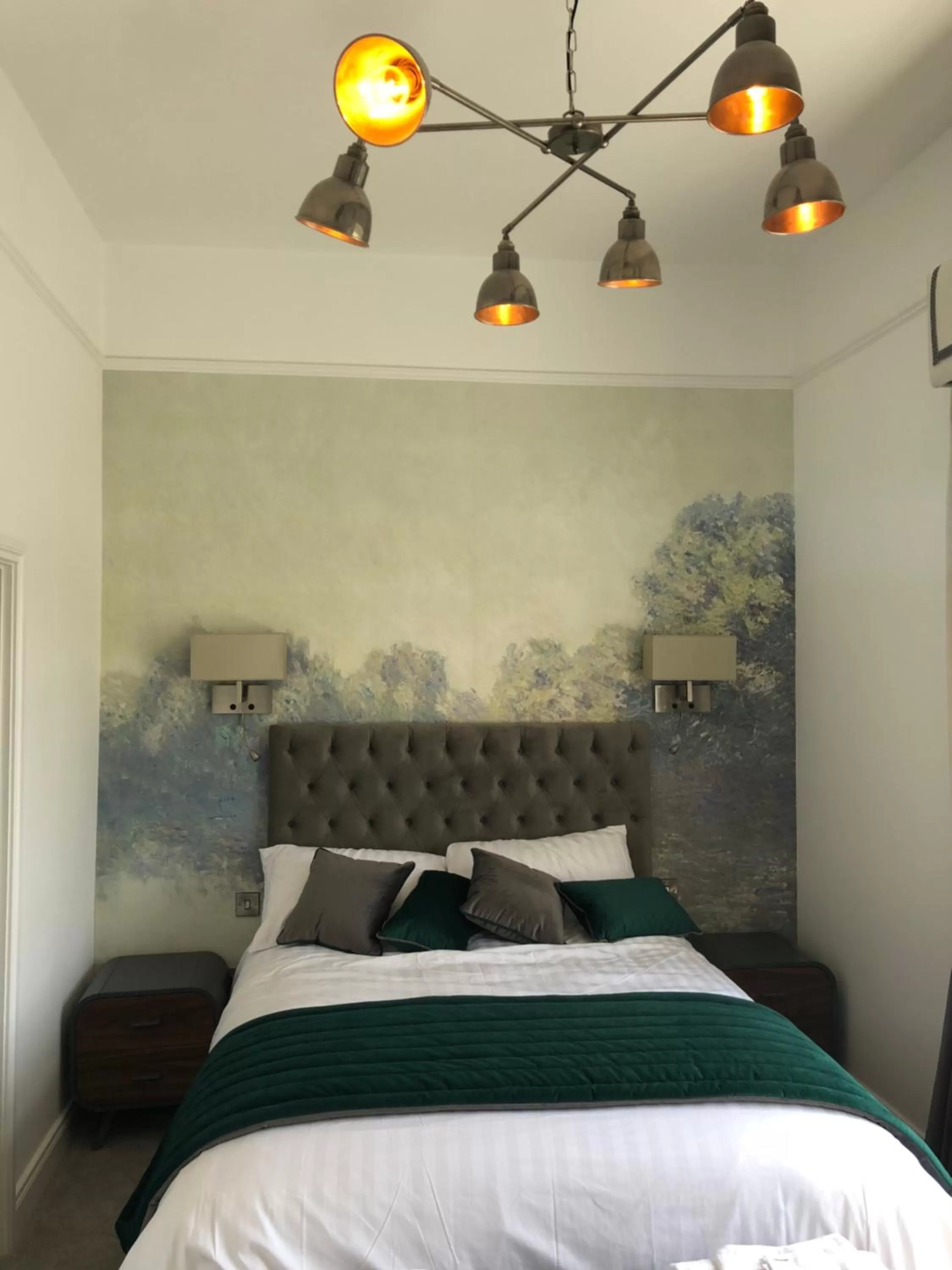 Photo of the whole room, Bed in The Strand Hotel, the former residence of Oscar Wilde