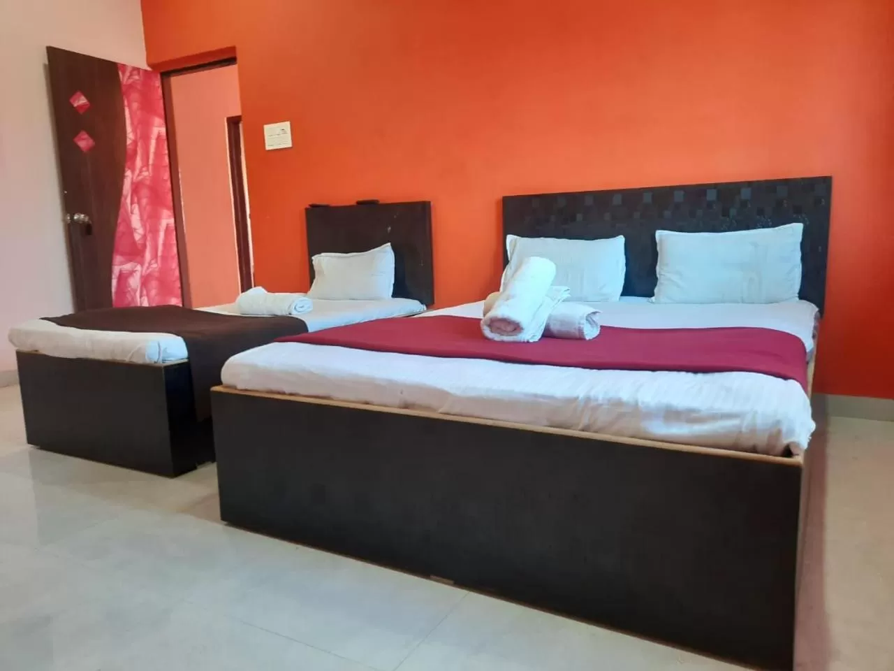 Bed in Hotel Nisarg Lodging And Restaurant