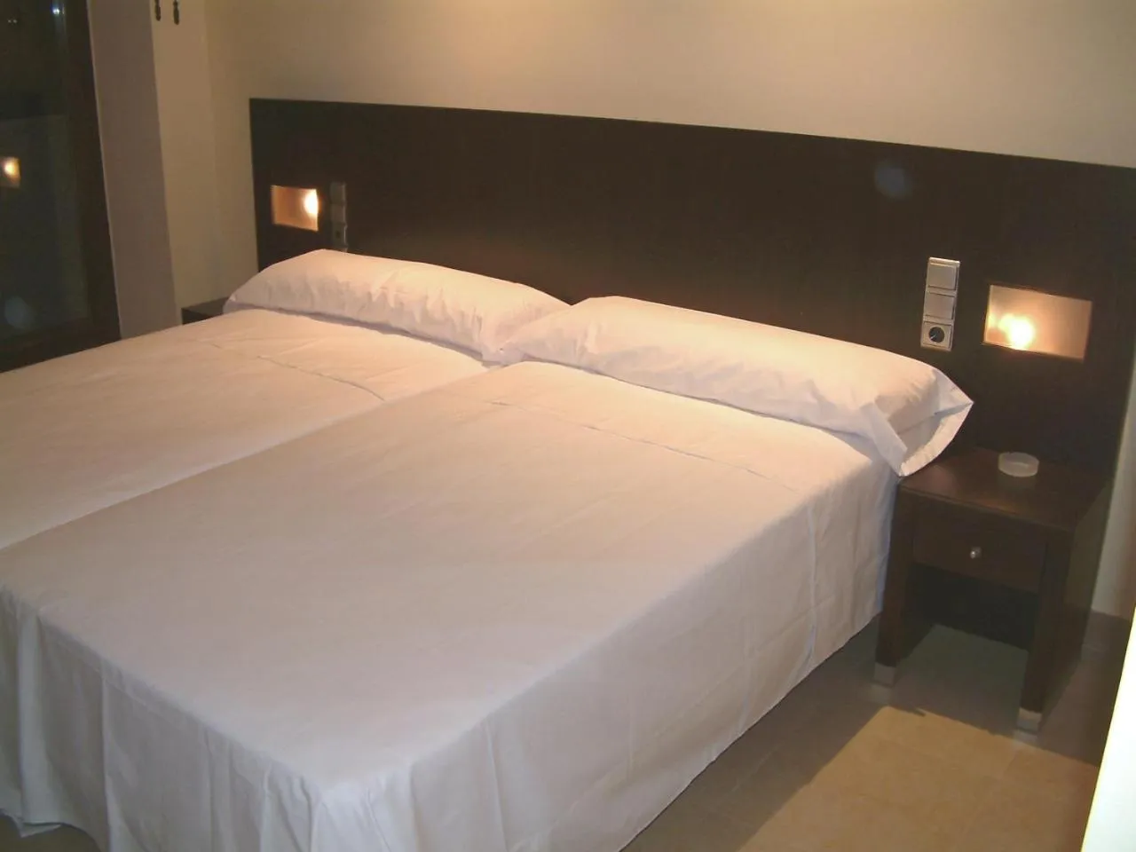 Bed in Hotel El Mesón