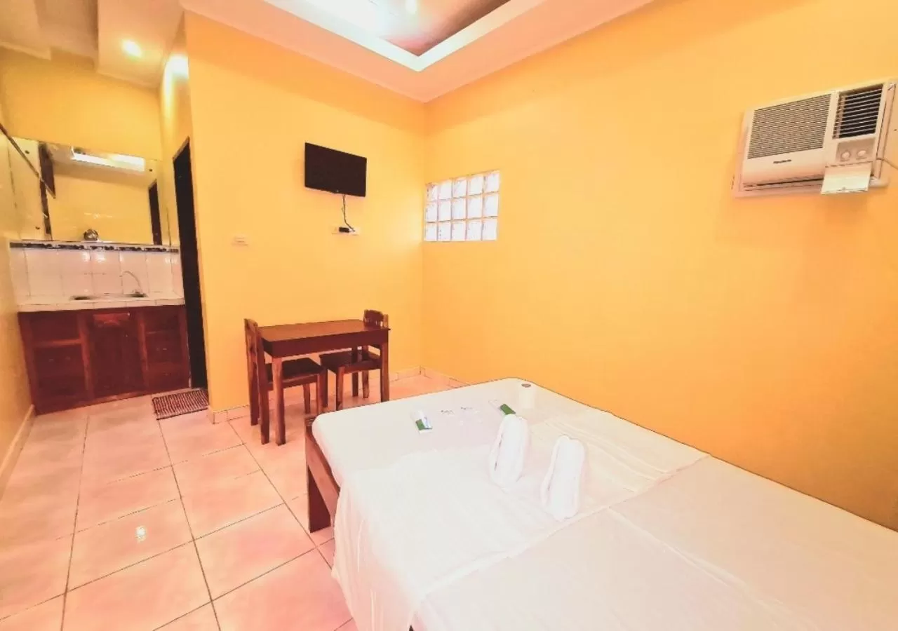 Bed in La-Familia Guest House