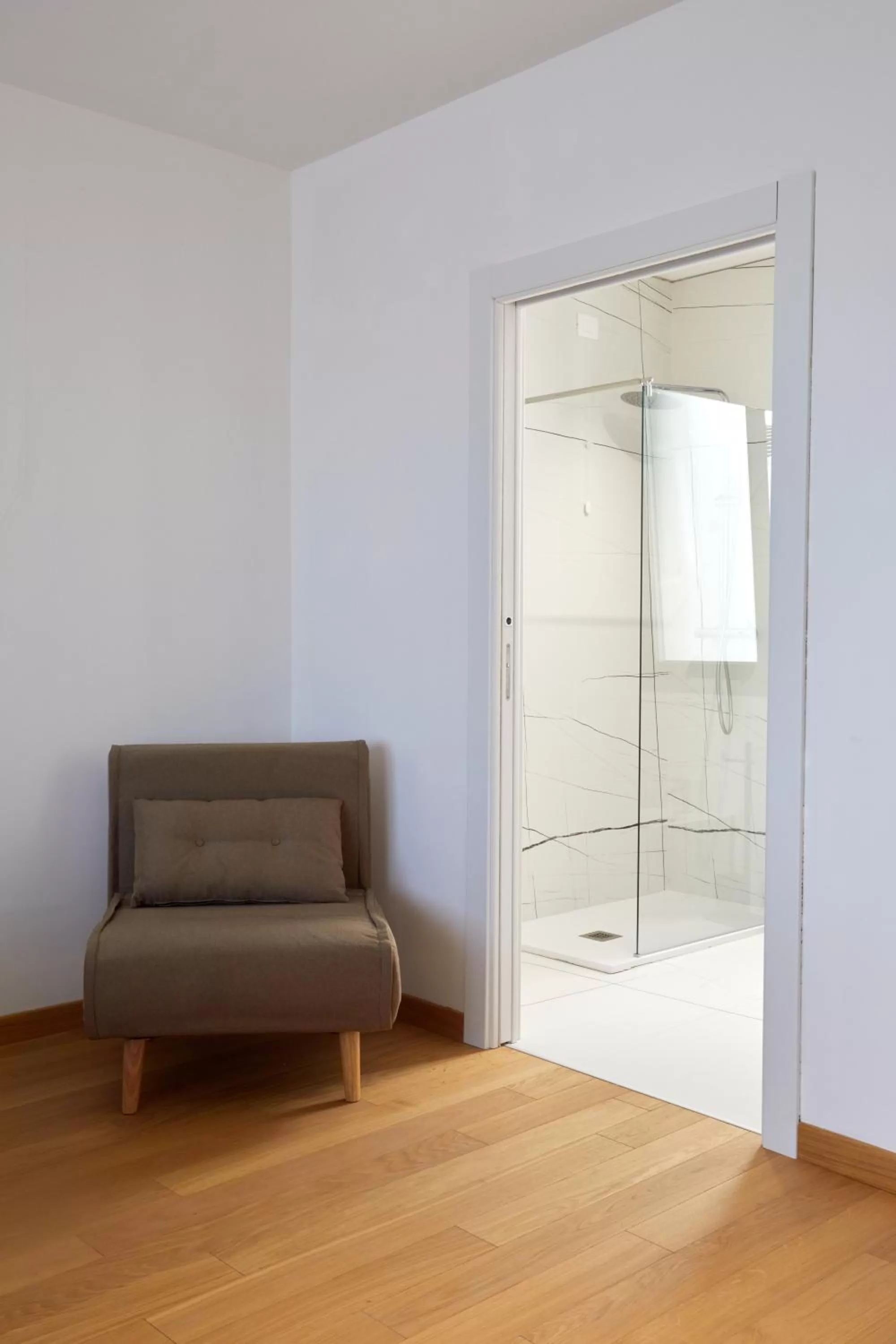 Seating Area in Glass House - Smart Rooms & Parking