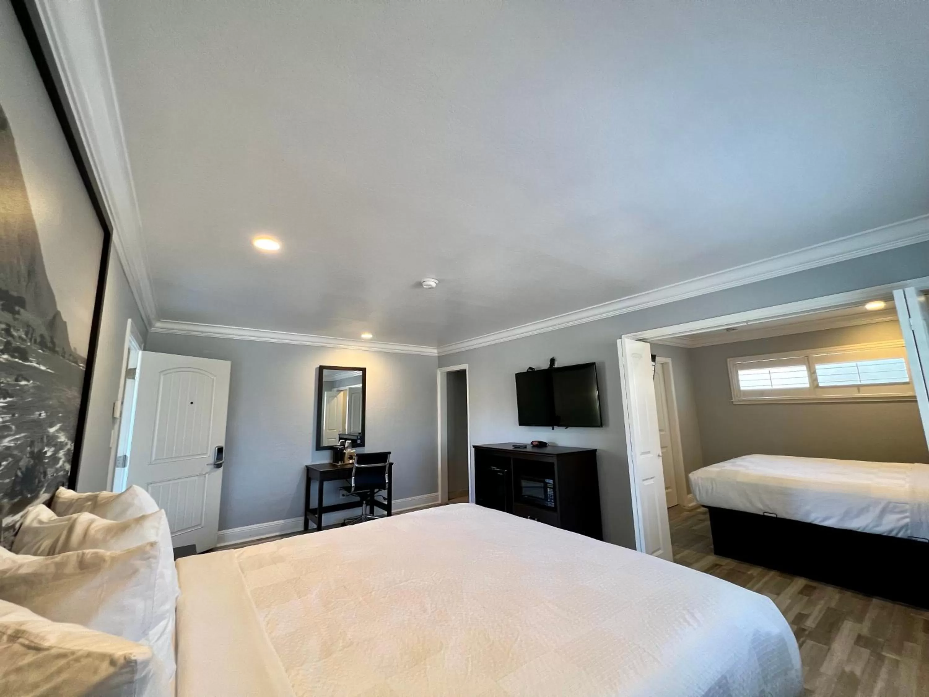 Bed in Aura Inn Monterey