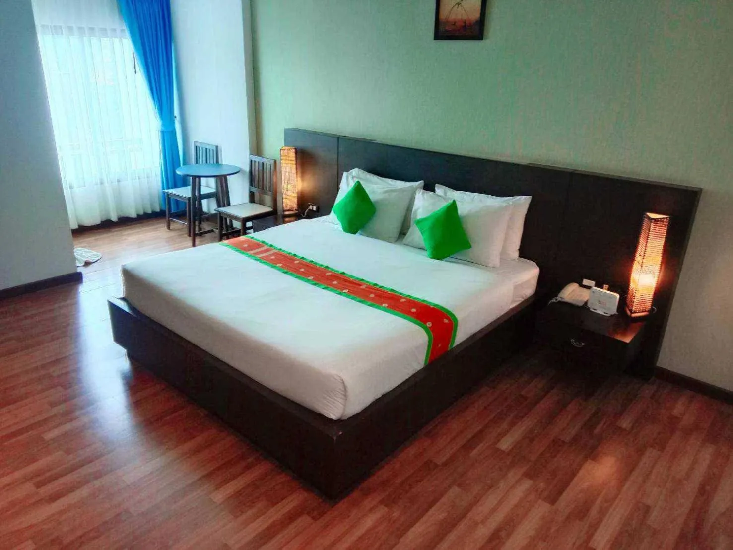 Bed in Jingjit Hotel