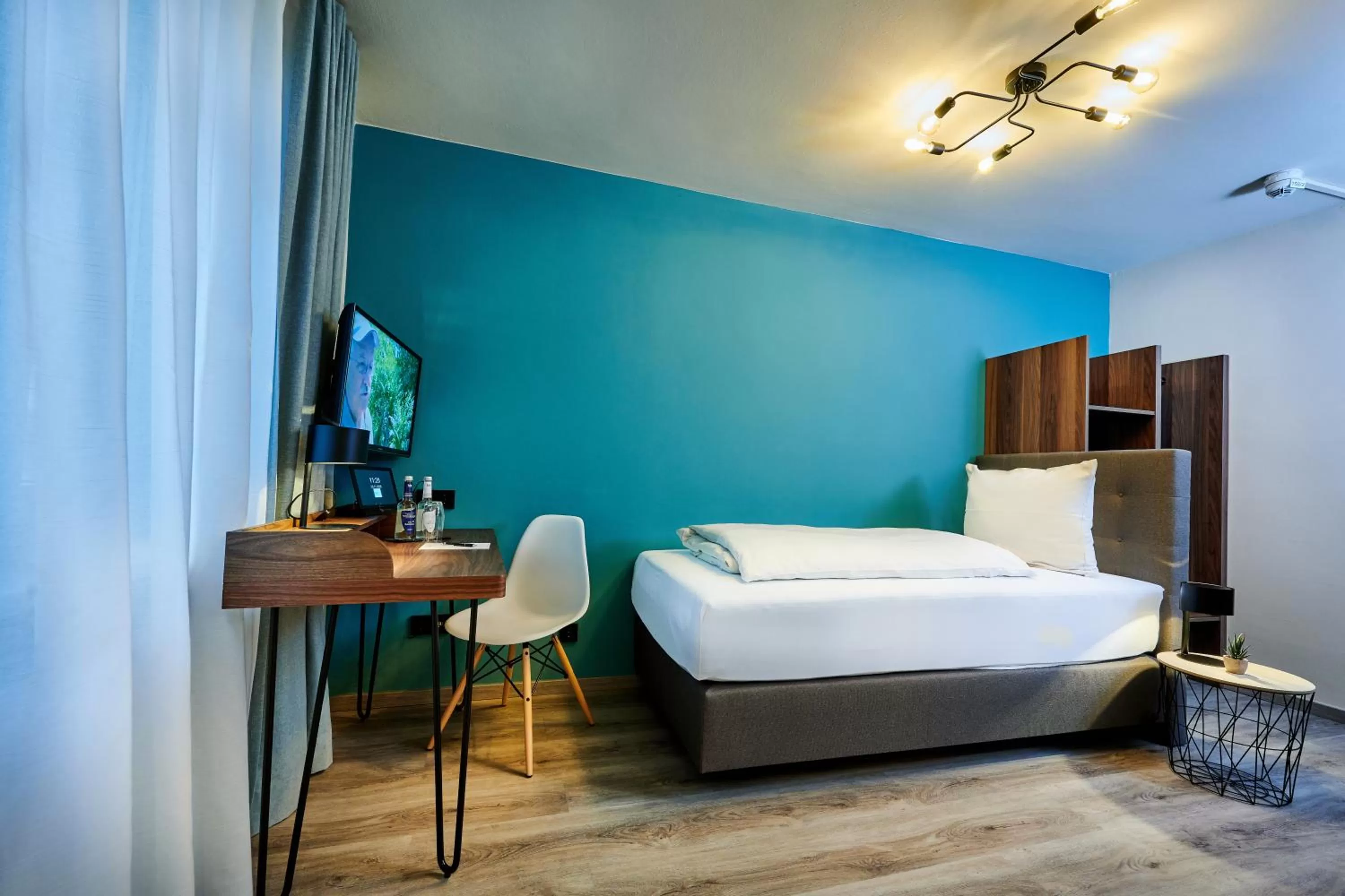 Photo of the whole room, Bed in Genusshotel Wenisch