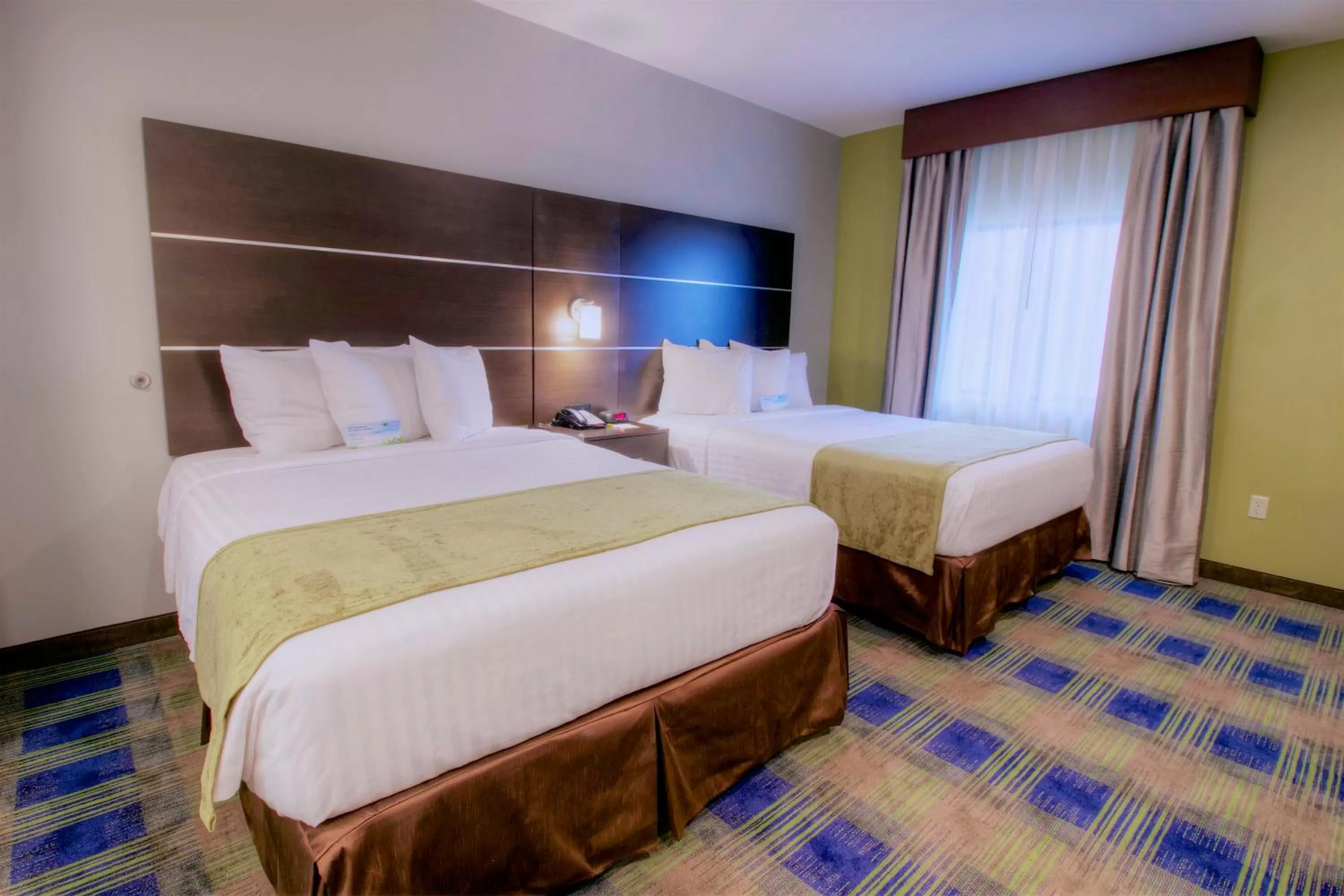 Bed in Days Inn & Suites by Wyndham Port Arthur