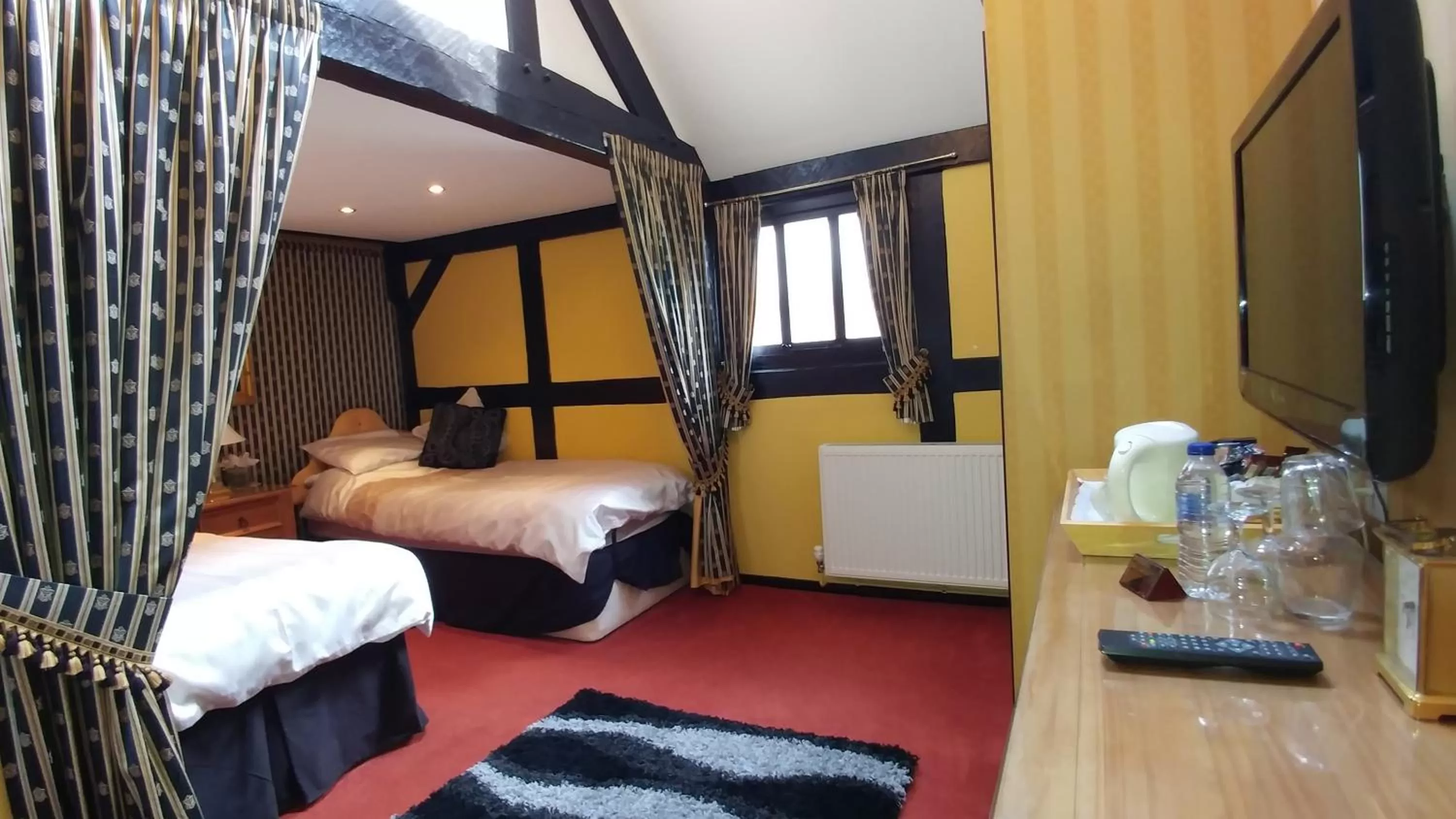 Bed in The Old Priory B&B