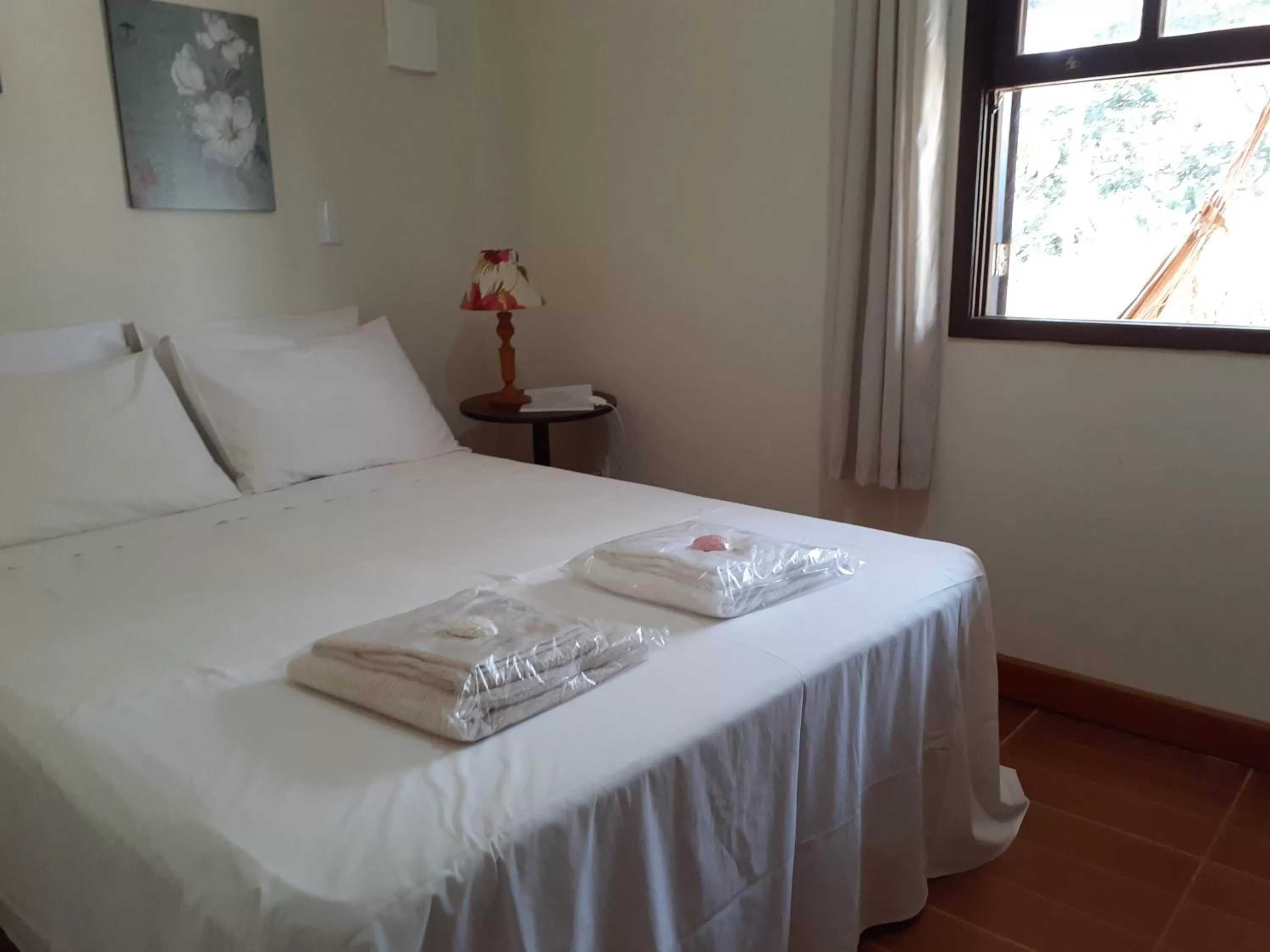 Bed in Pousada R.N.C. Nosso Paraíso