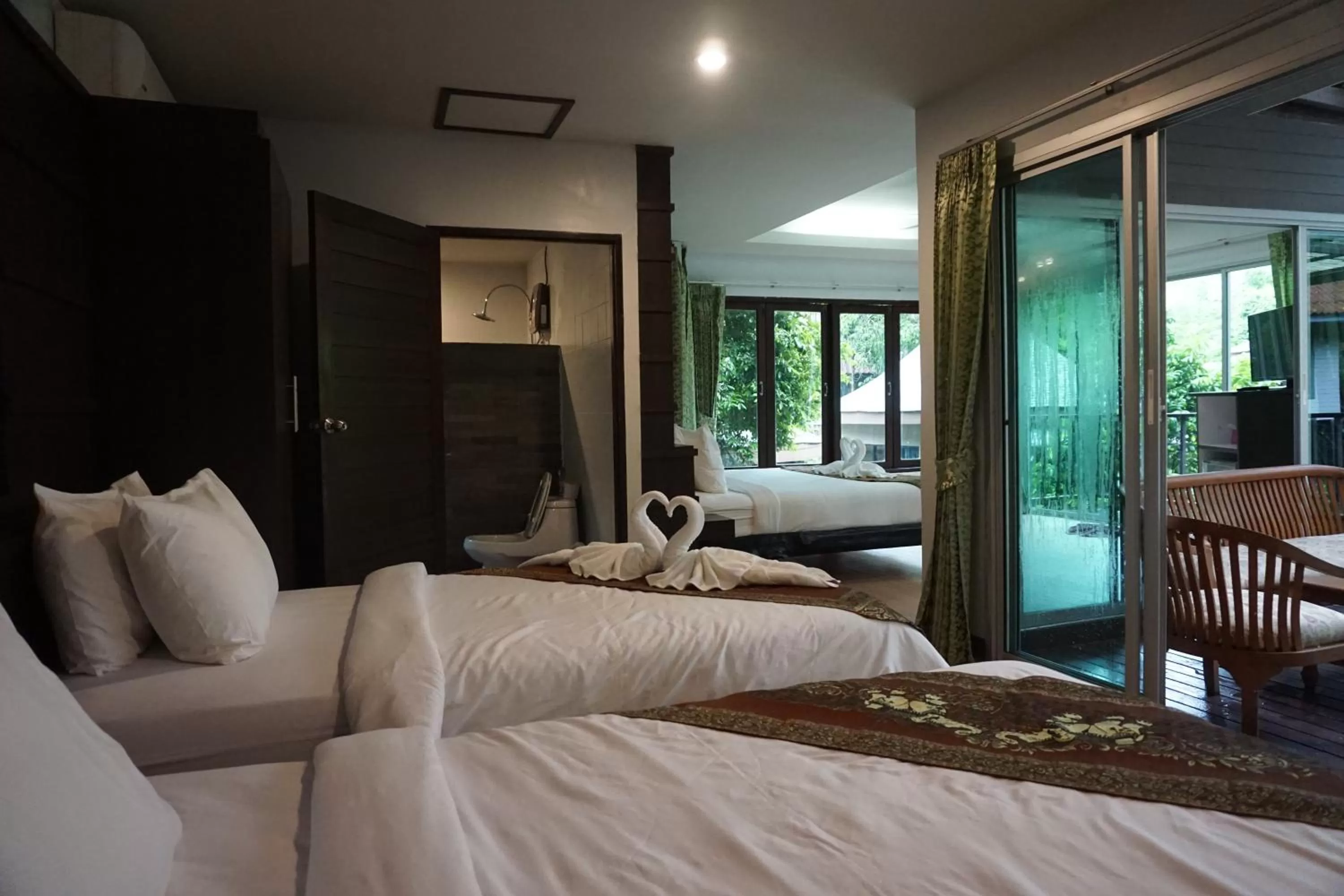 Bed in Rock and Tree House Resort