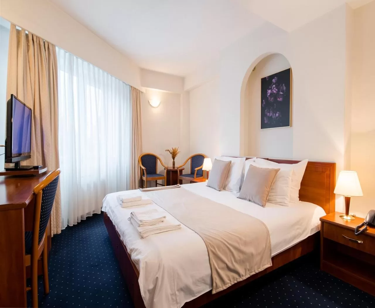 Bed in Hotel Excelsior By TimHotels