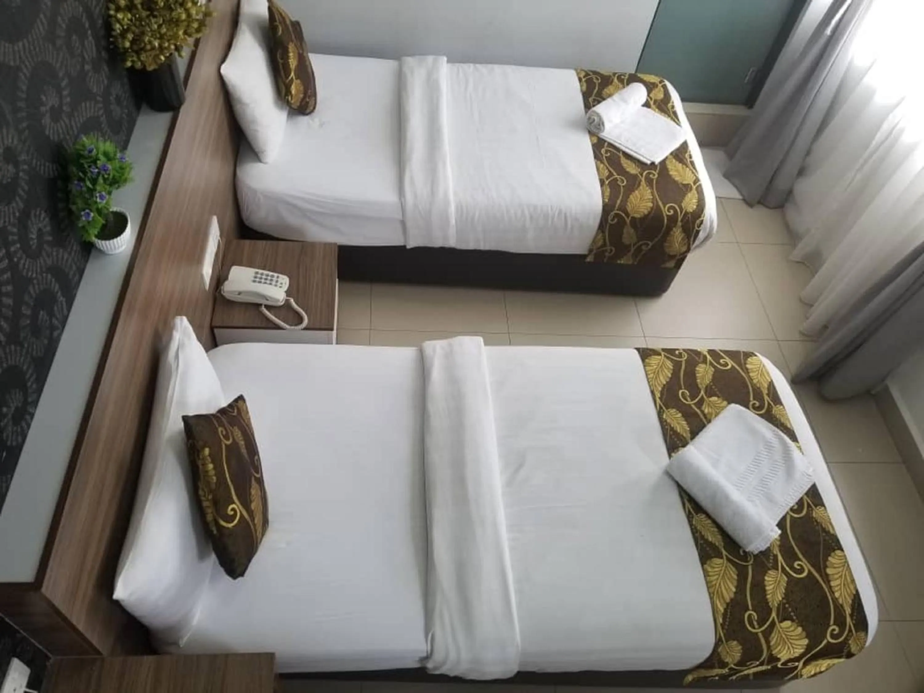 Photo of the whole room, Bed in D'Metro Hotel