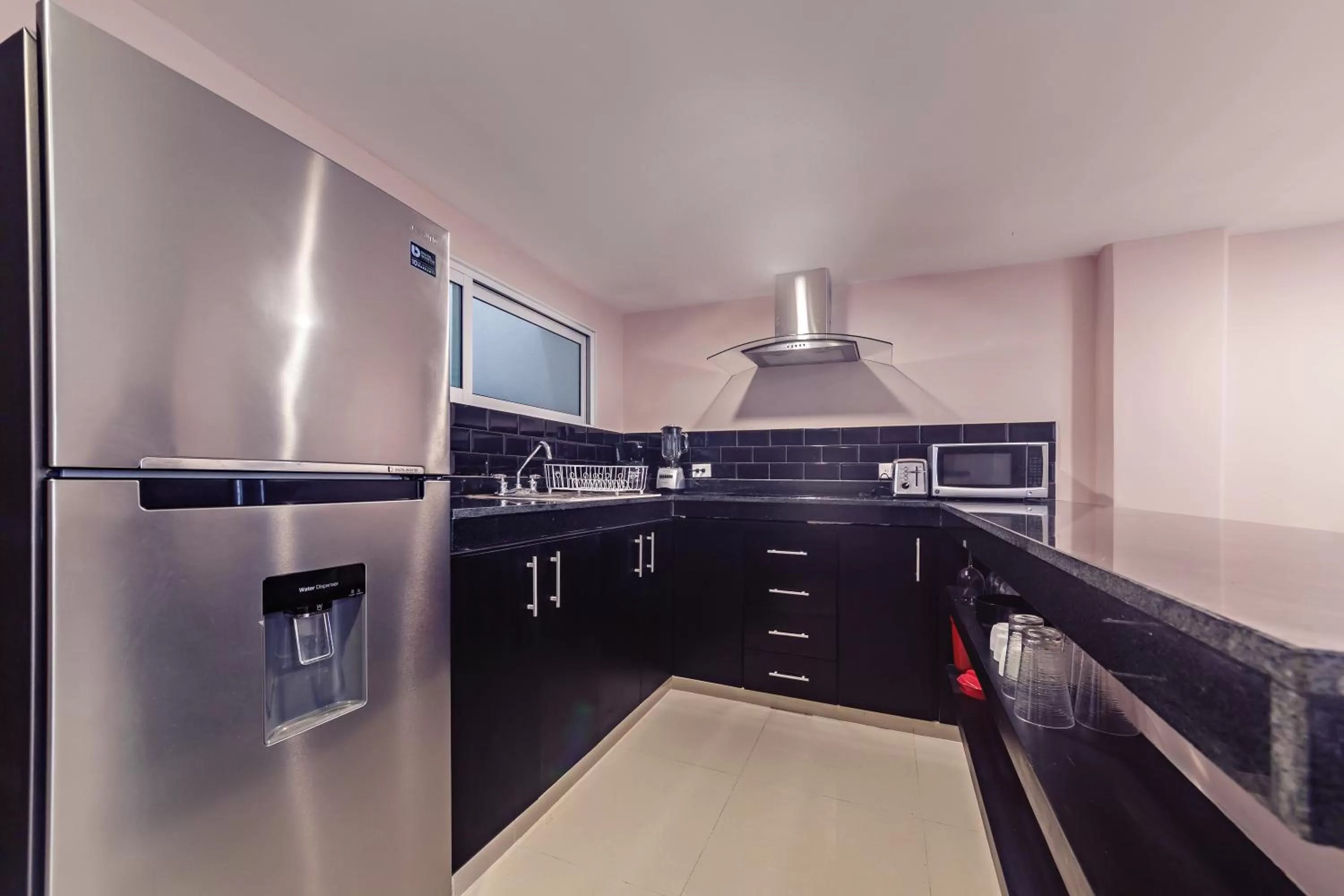 Kitchen or kitchenette in Hotel CARPE DIEM Tulum by Nah Hotels