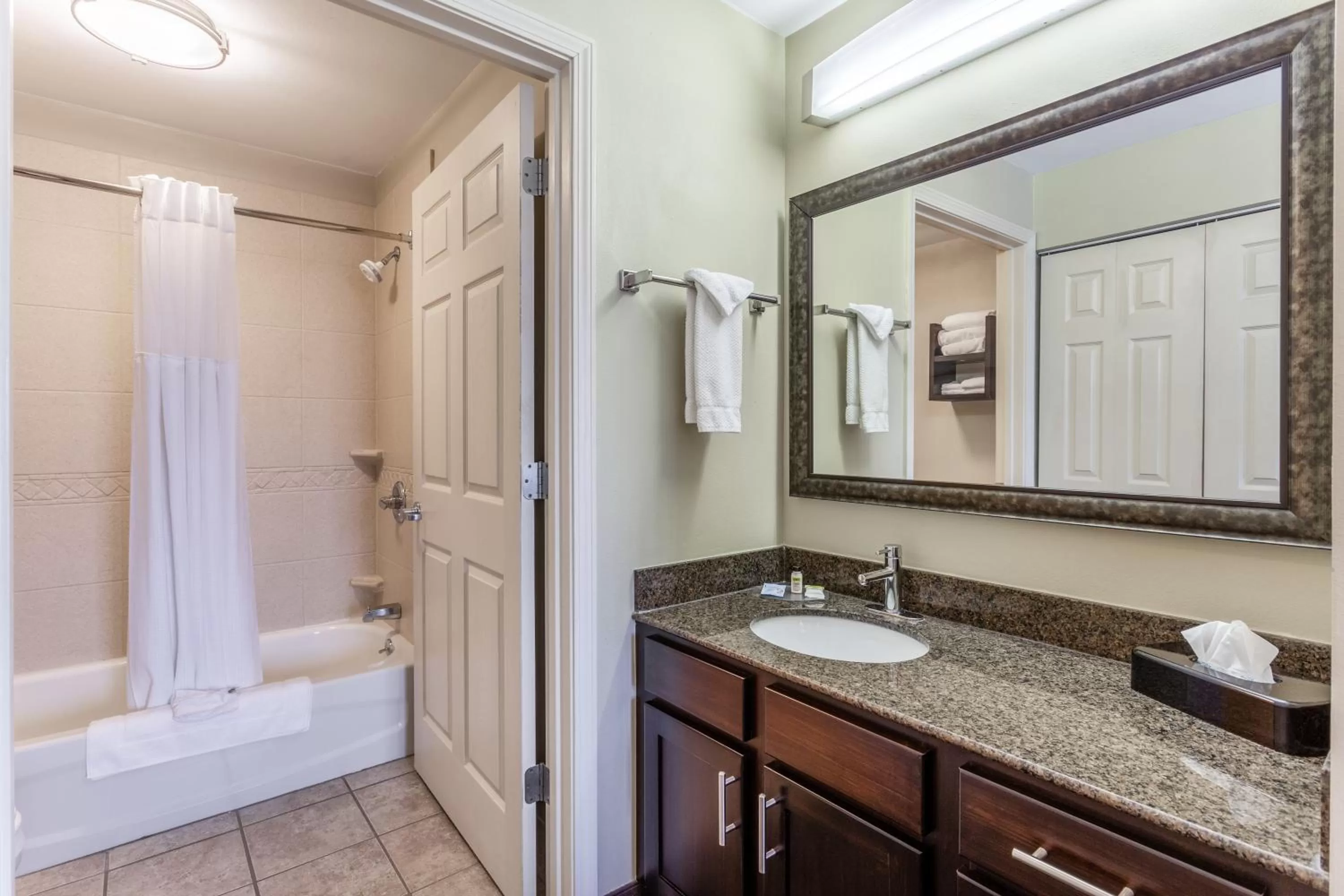 Bathroom in Candlewood Suites Harrisburg I-81 Hershey Area by IHG