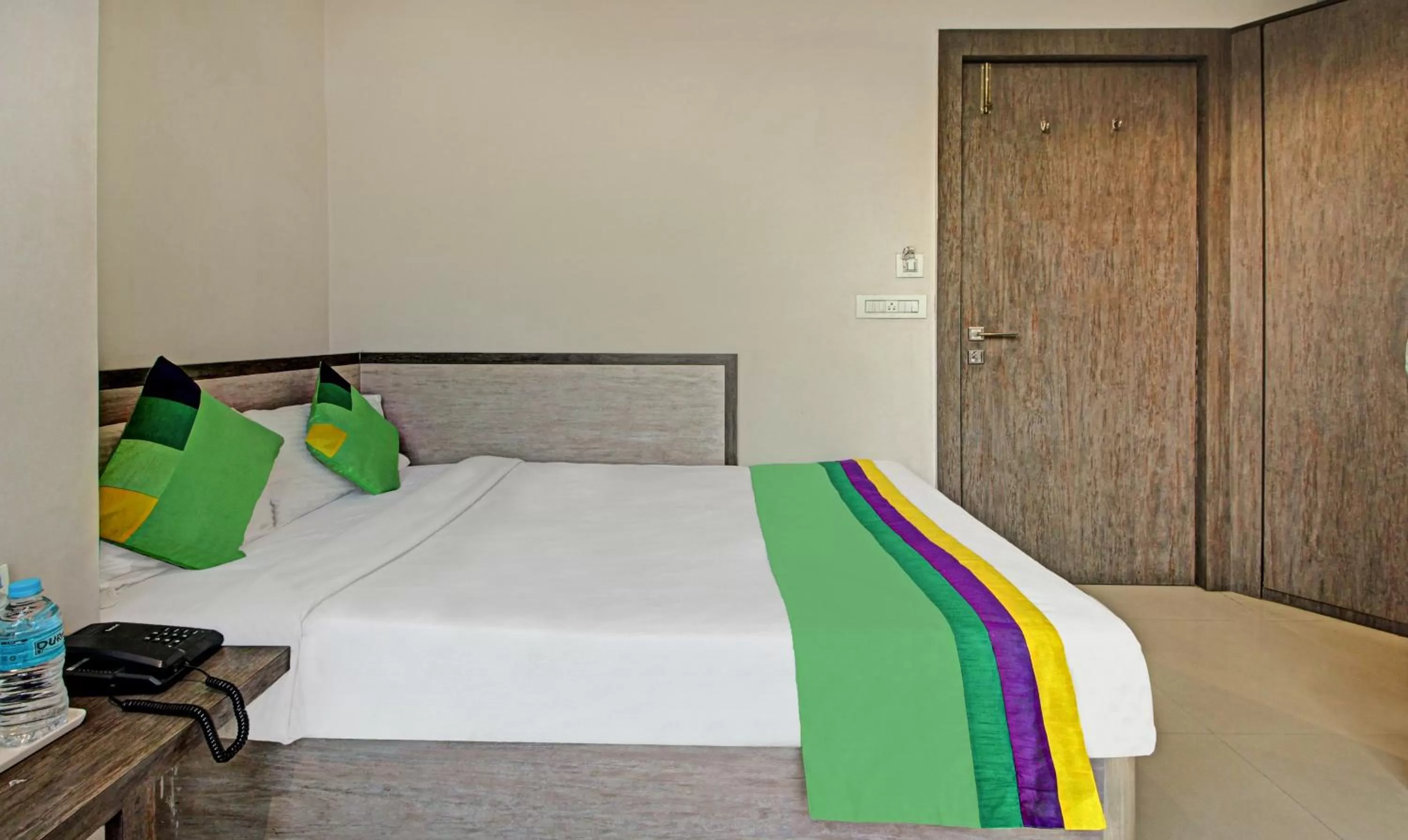 Bed in Treebo Trend Glassotel Ruby