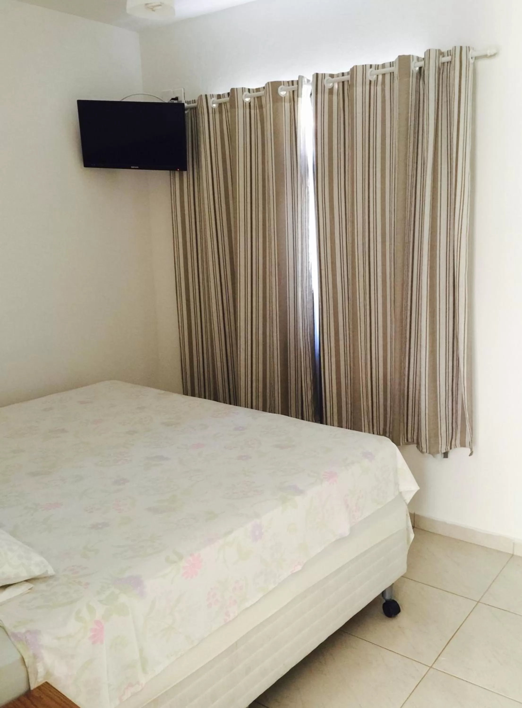 Bed in Pousada Almeida