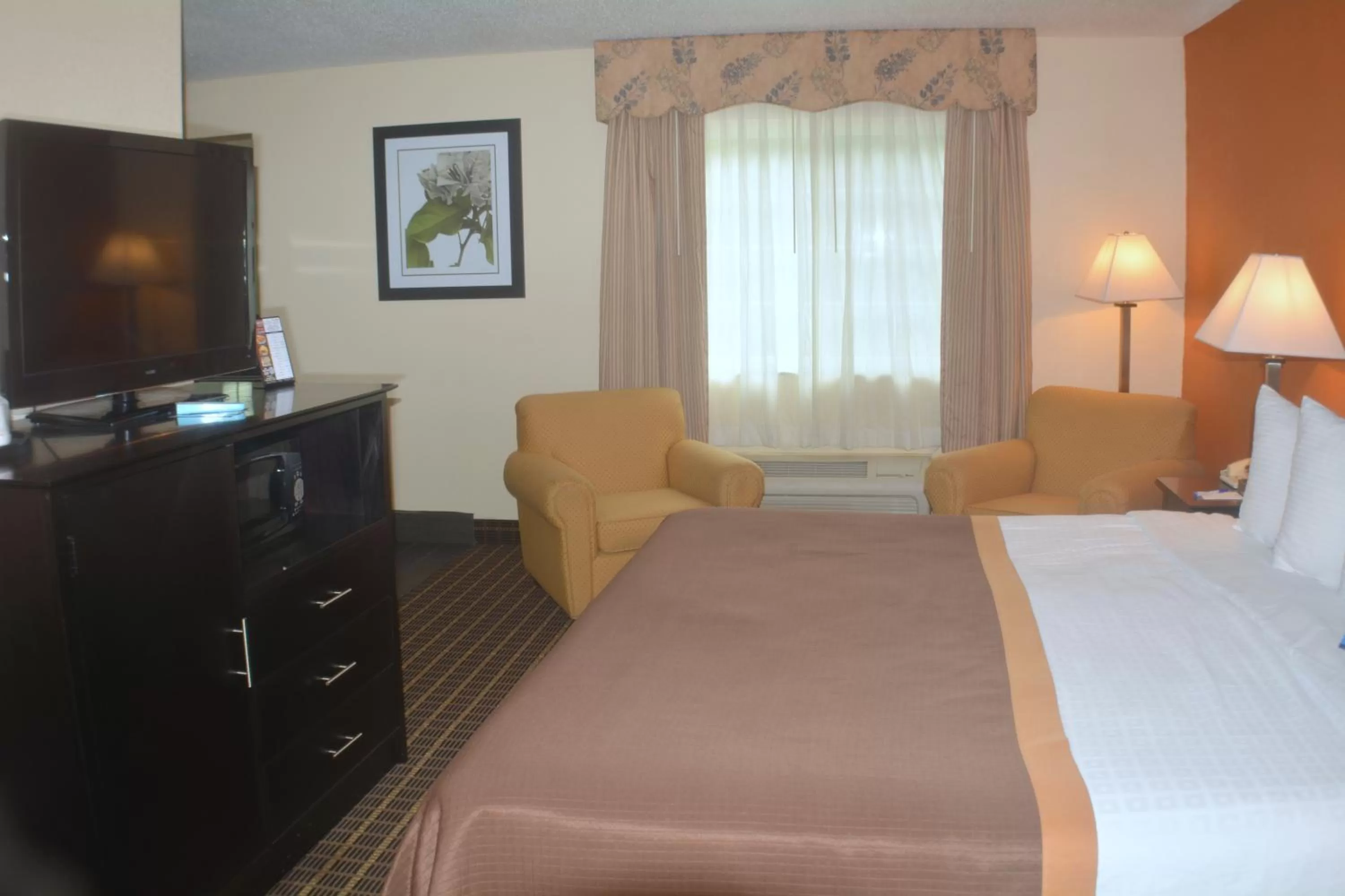 Bed in Baymont by Wyndham Muskegon